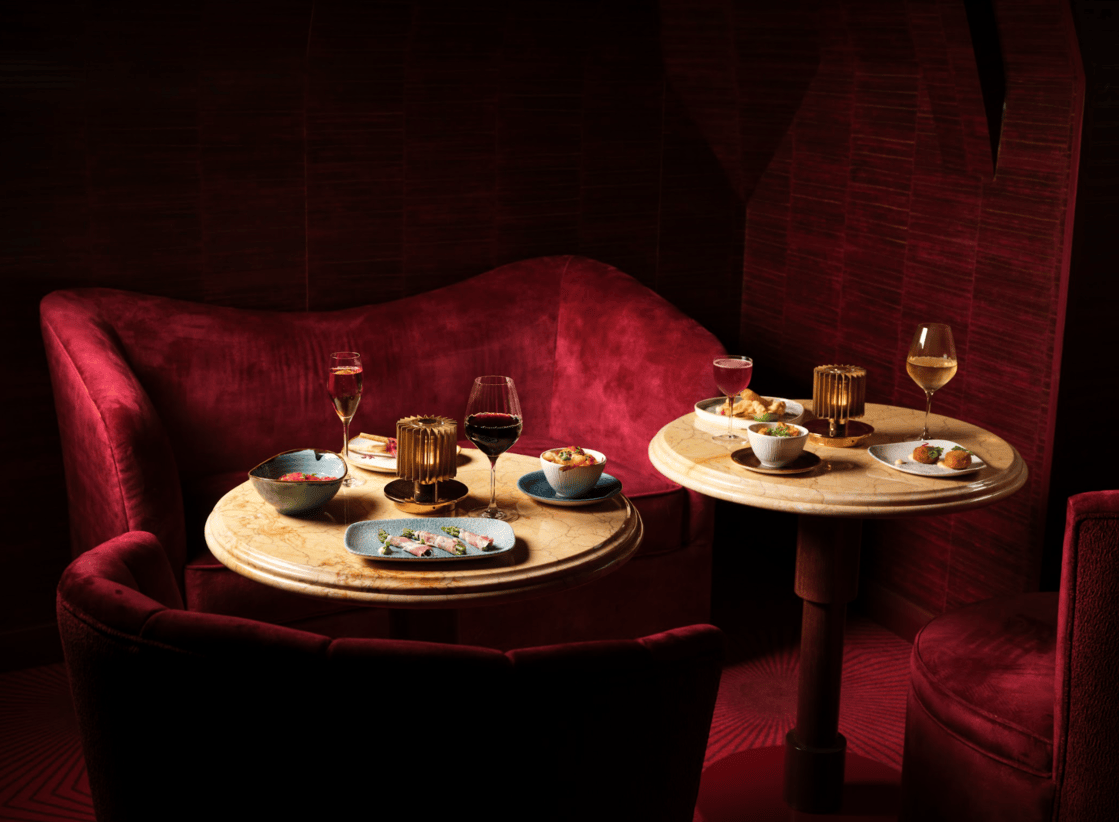 london-kings-cross-six-storey-multi-studio-venue-club-roof-terrace-film-photo-shoot-events-location-unique-venue-hire-circular-tables-food-wine.png