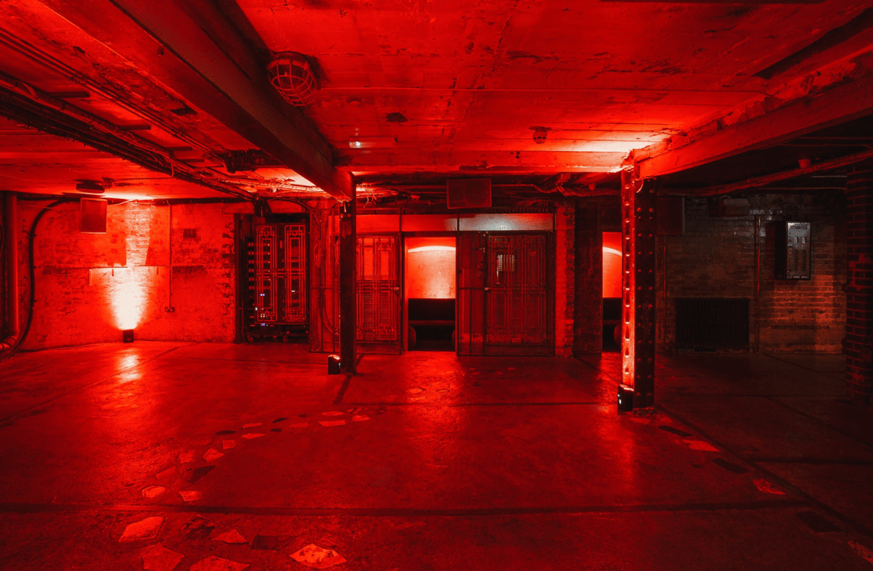 london-kings-cross-six-storey-multi-studio-venue-club-roof-terrace-film-photo-shoot-events-location-unique-venue-hire-large-red-uplit-room.png
