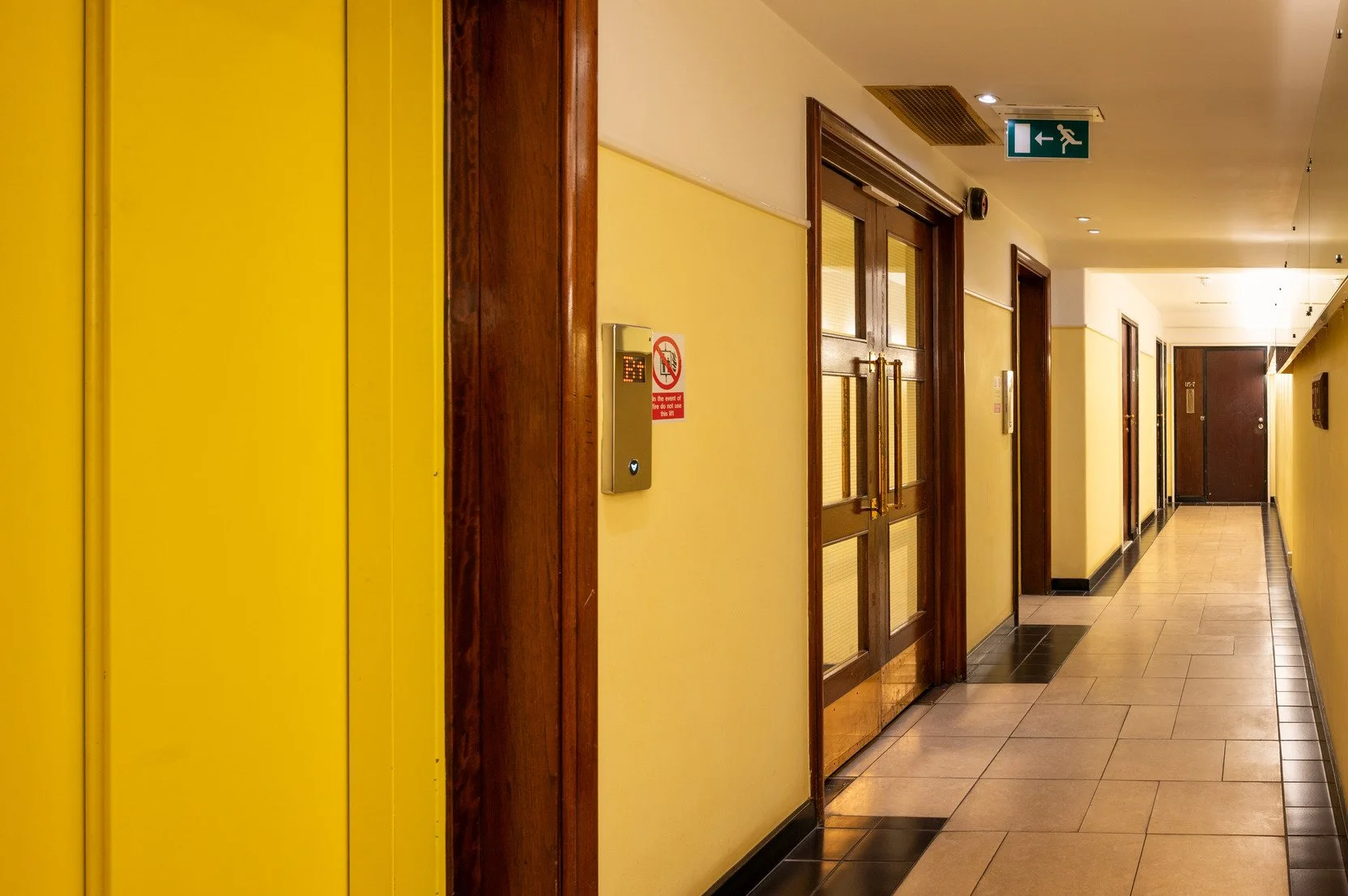 florin-court-london-art-deco-film-photo-shoot-location-hire-yellow-hall-way.jpg