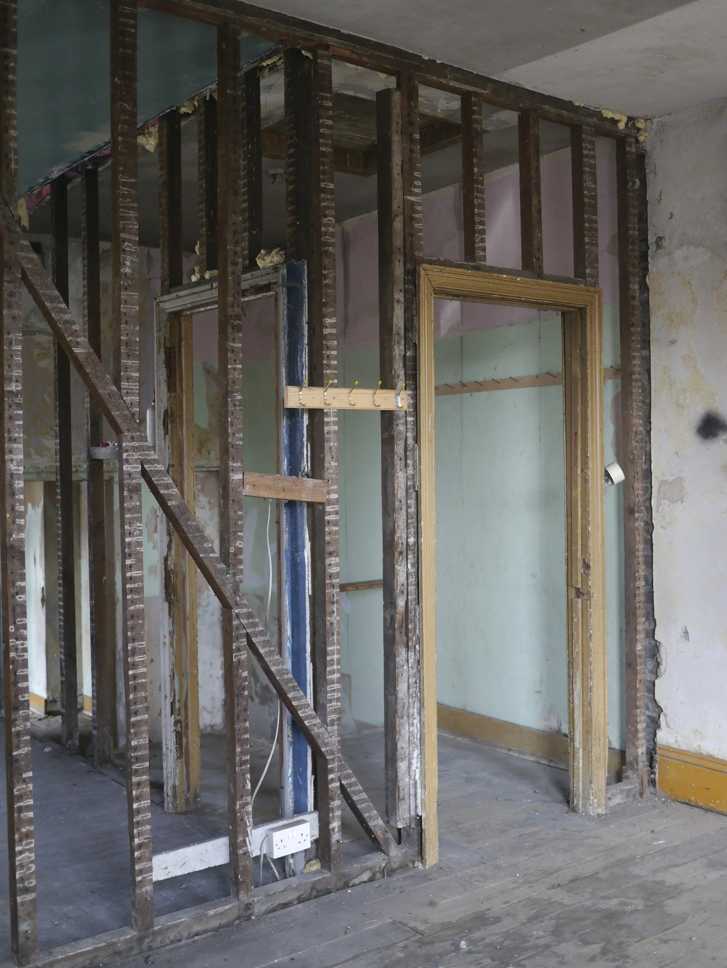 london-dilapidated-victorian-property-double-height-location-film-photo-shoot-hire-wall-exposed-wooden-struts.jpg