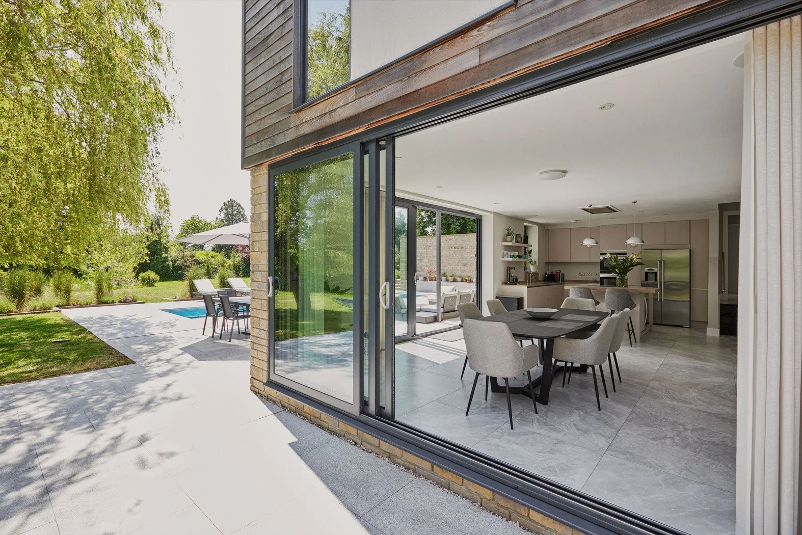 surrey-contemporary-luxury-residence-film-photo-shoot-events-location-hire-external-view-dining-room.jpg