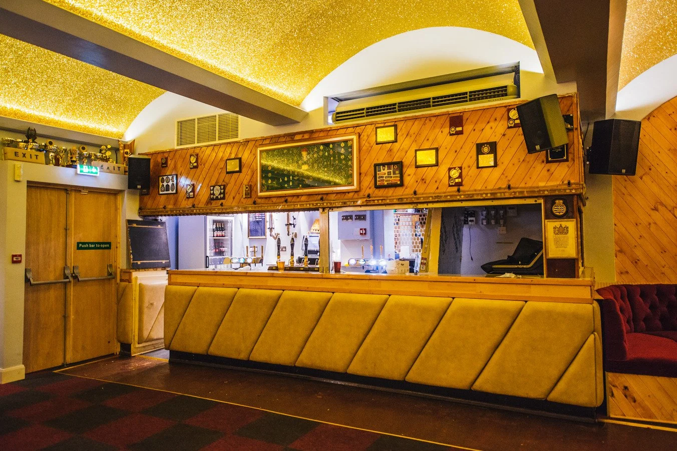london-historic-iconic-retro-working-mens-club-film-photo-shoot-location-hire-red-fan.jpg