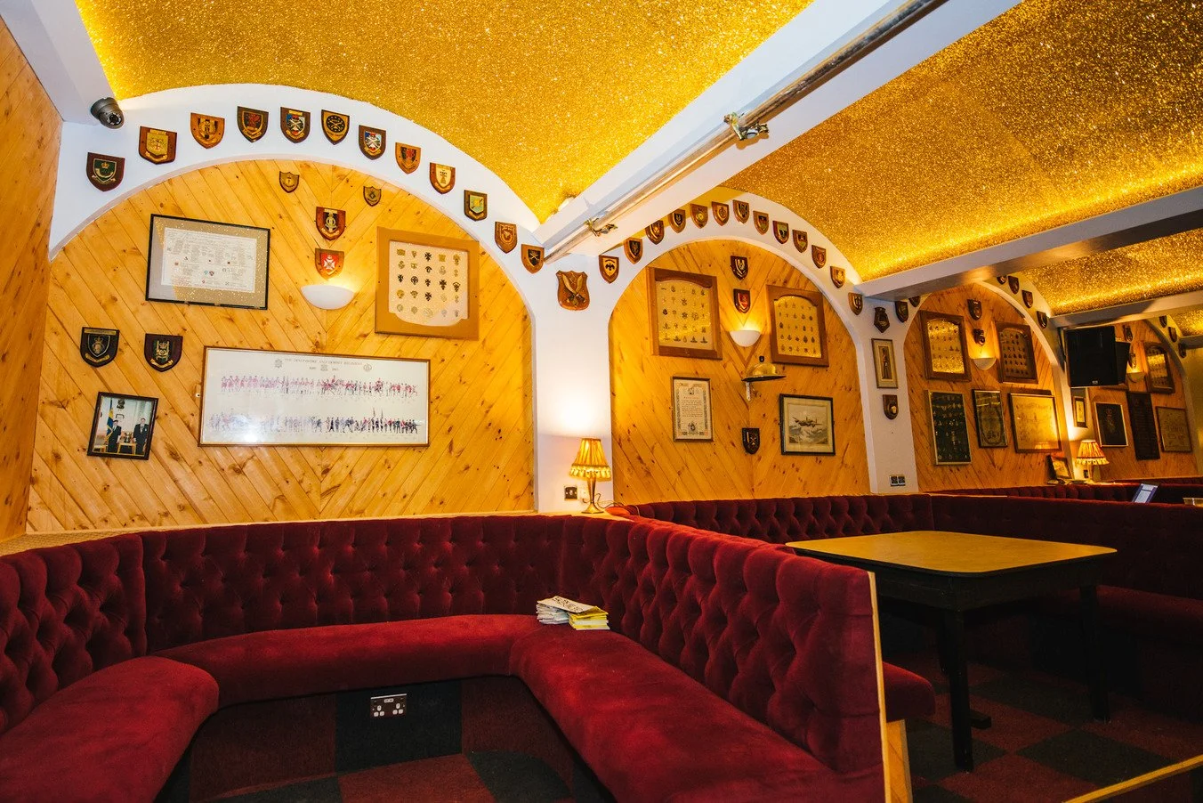london-historic-iconic-retro-working-mens-club-film-photo-shoot-location-hire-red-gold-glitter-wall.jpg