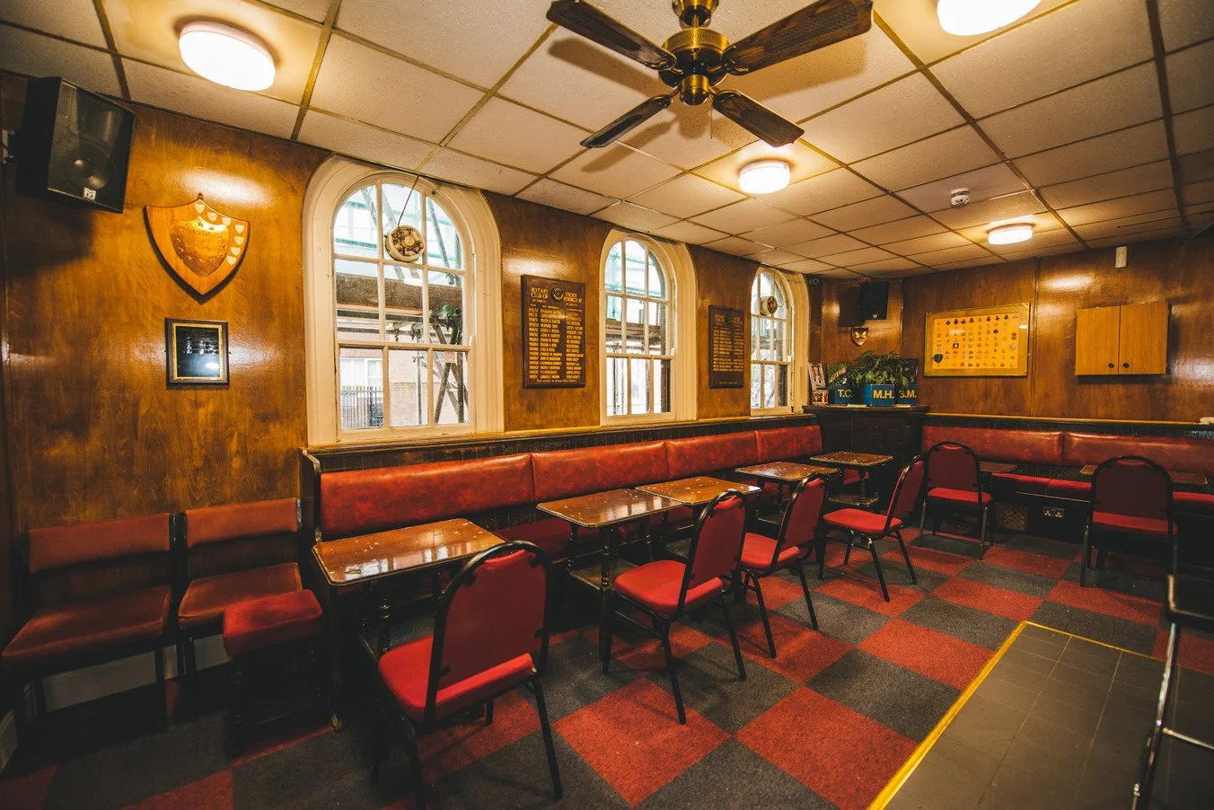 london-historic-iconic-retro-working-mens-club-film-photo-shoot-location-hire-red-seating.jpg