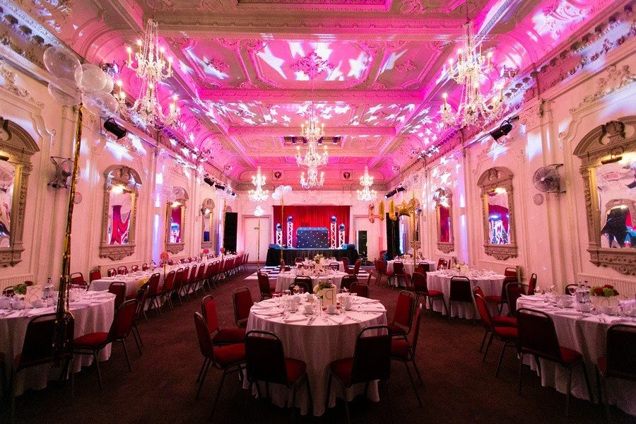london-historic-edwardian-dance-hall-events-film-photo-shoot-location-hire-dining-pink-lighting.jpg