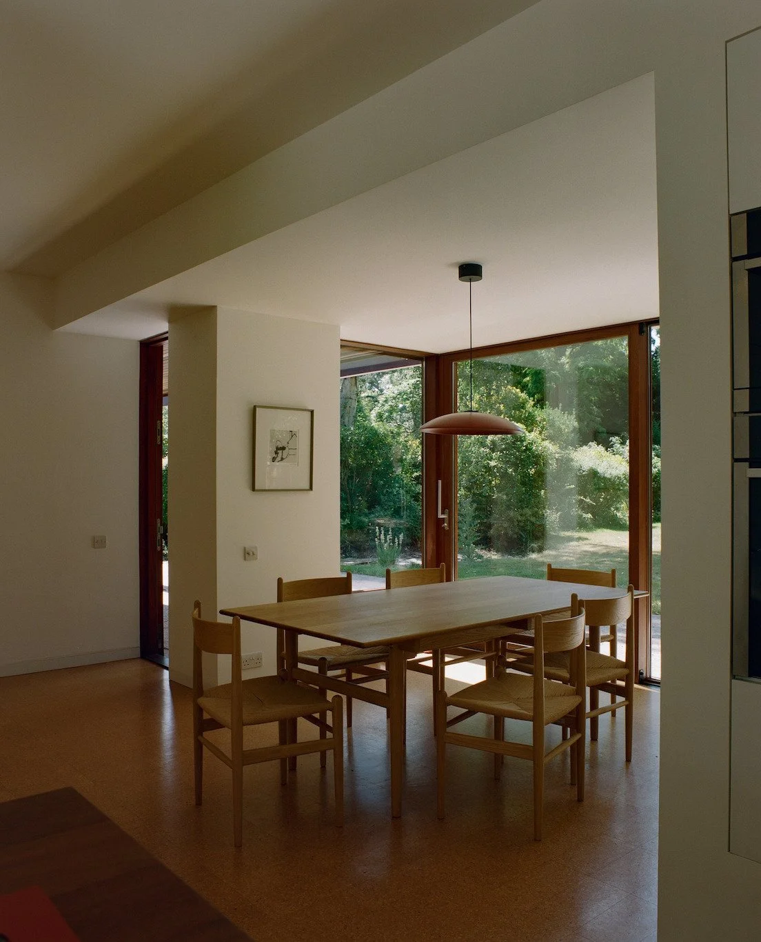 london-retro-mid-century-modernist-courtyard-bungalow-film-photo-shoot-location-hire-dining-area-window.jpg