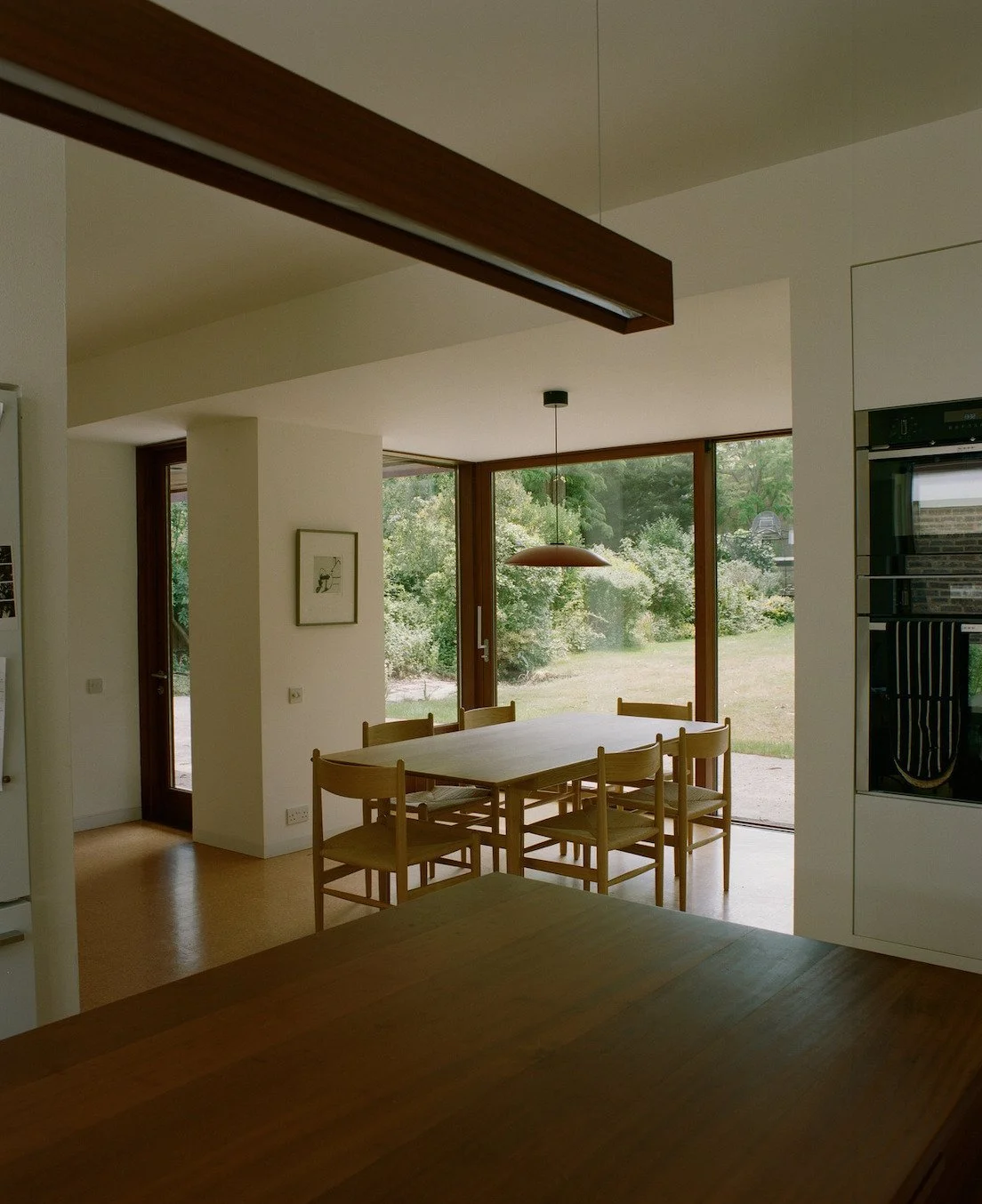 london-retro-mid-century-modernist-courtyard-bungalow-film-photo-shoot-location-hire-dining-room-table.jpg
