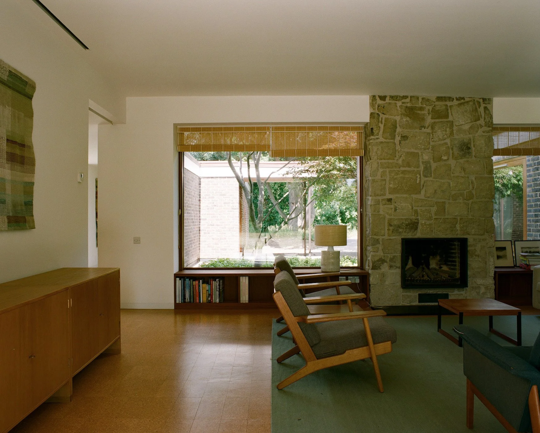 london-retro-mid-century-modernist-courtyard-bungalow-film-photo-shoot-location-hire-lounge-fireplace.jpg