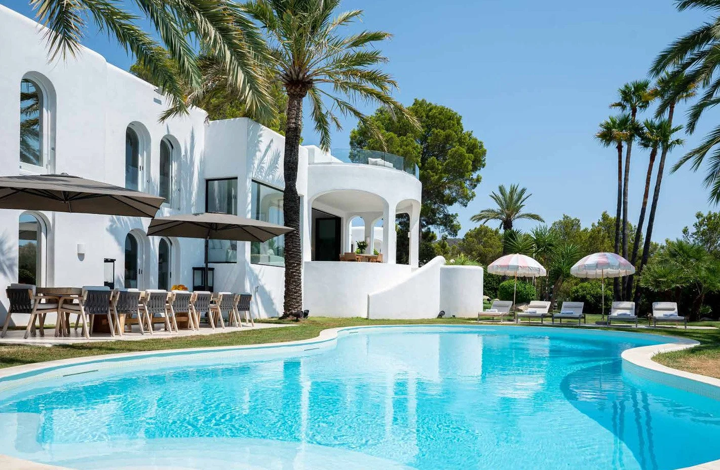 ibiza-modern-mediterranean-luxury-villa-film-photo-shoot-location-hire-poolside-umbrellas.jpg