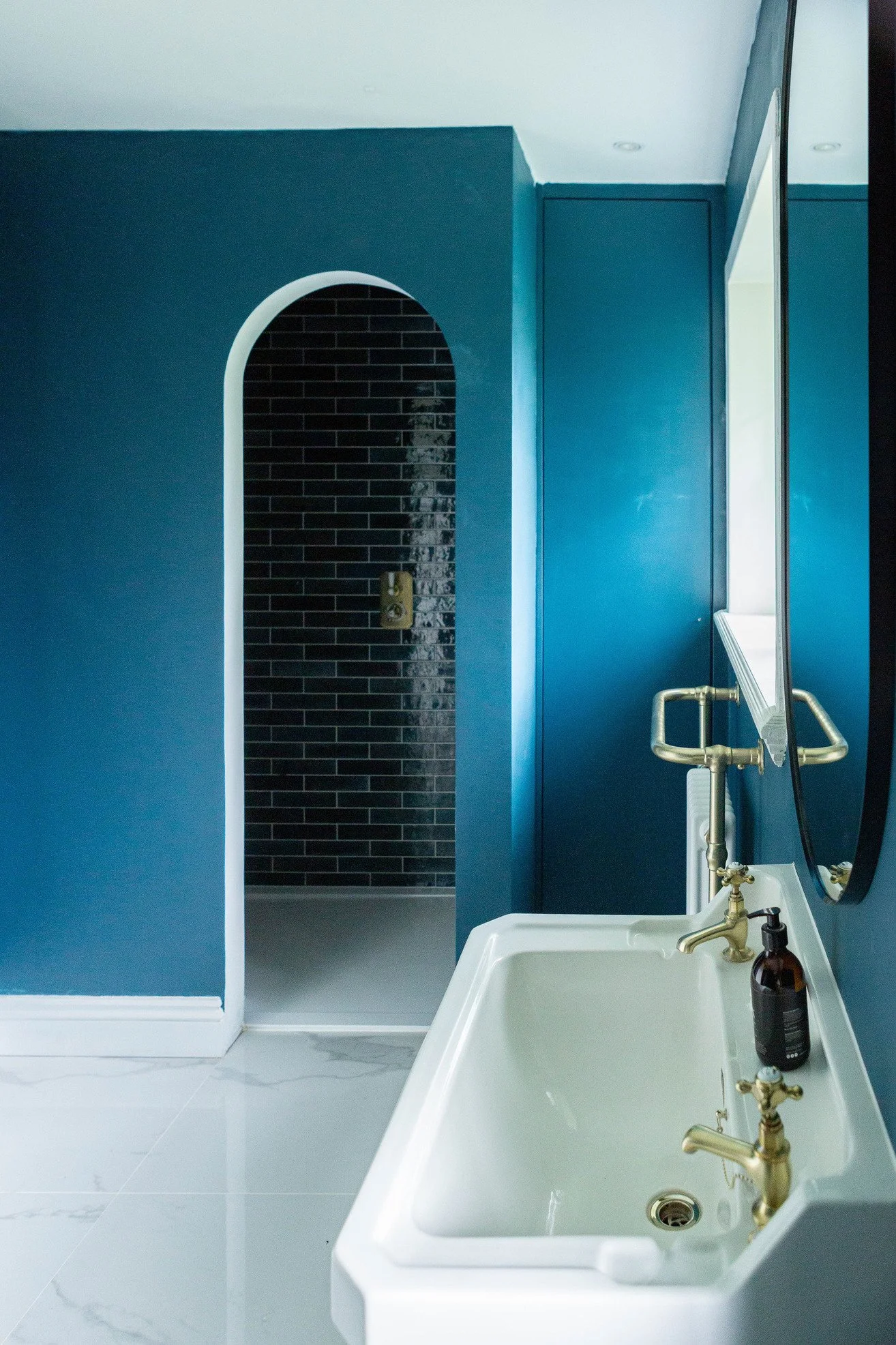 london-victorian-riverside-residence-film-photo-shoot-location-hire-blue-bathroom-archway.jpg