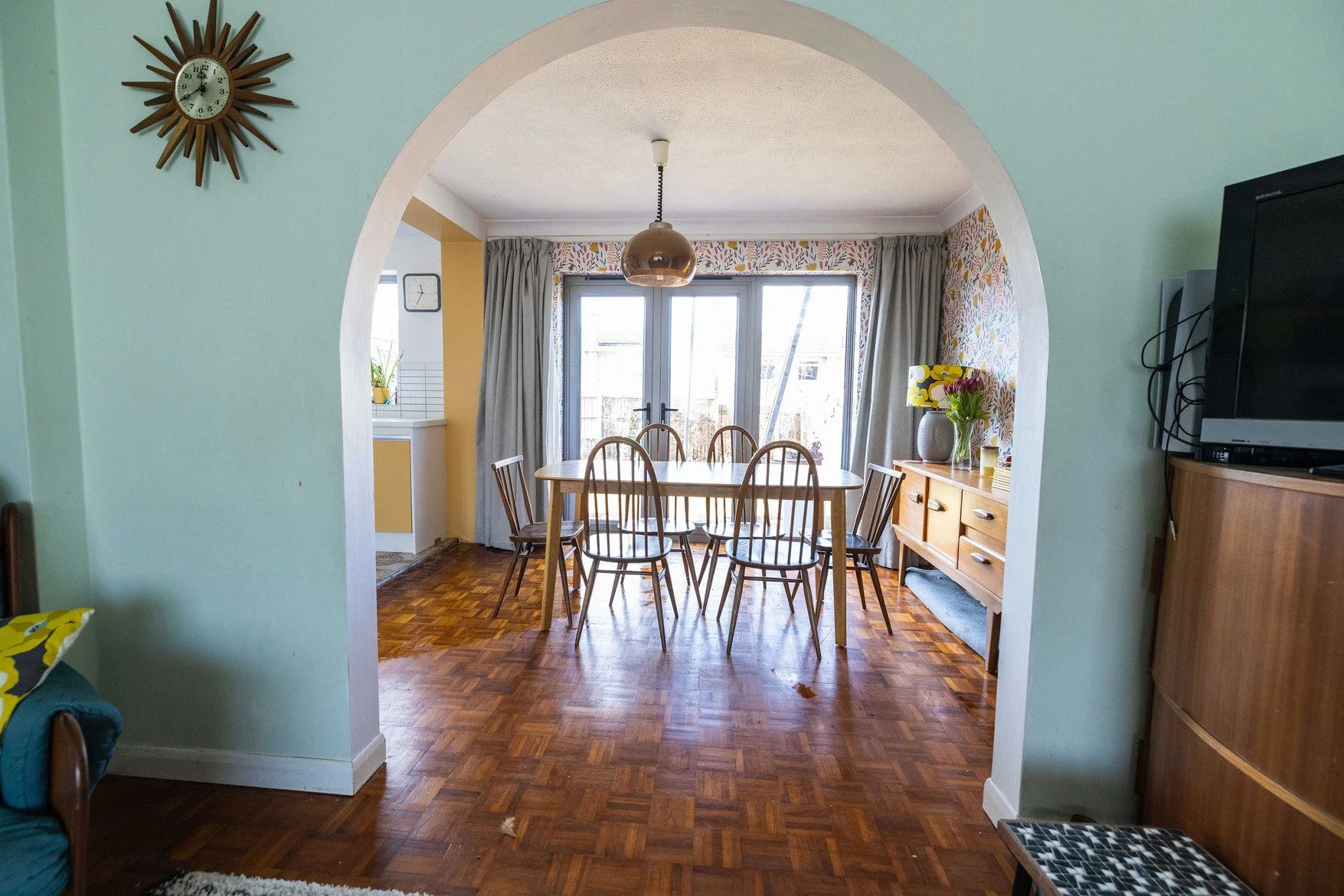 essex-1970s-suburban-house-retro-film-photo-shoot-location-hire-dining-room-archway.jpg