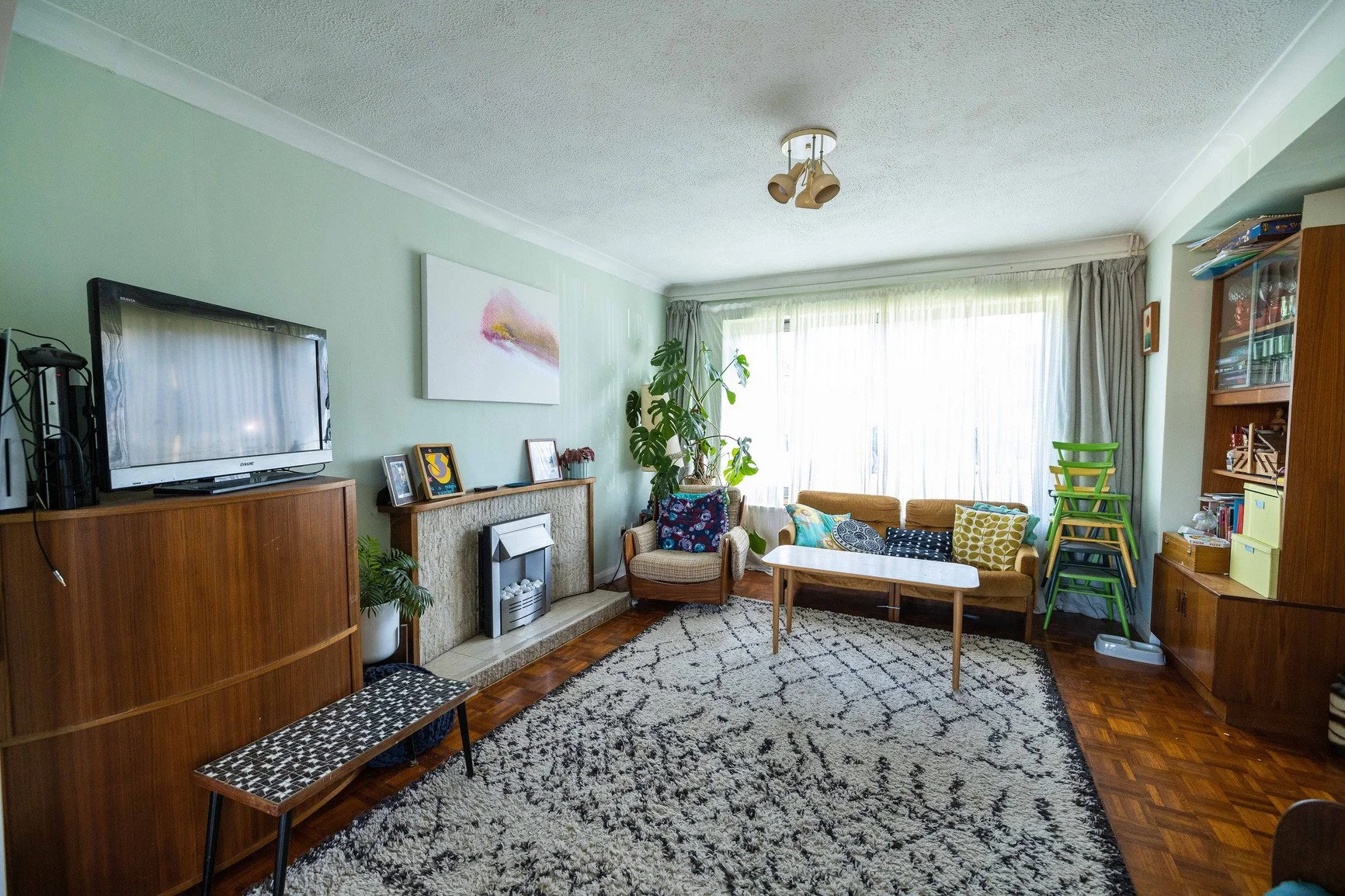 essex-1970s-suburban-house-retro-film-photo-shoot-location-hire-lounge-fireplace.jpg