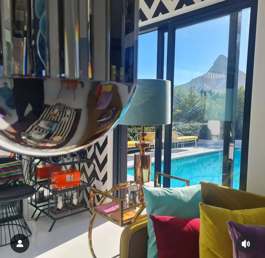 hire-a-cape-town-mid-century-maximalist-villa-film-photo-shoot-event-location-patio-doors-mountain-views.jpg