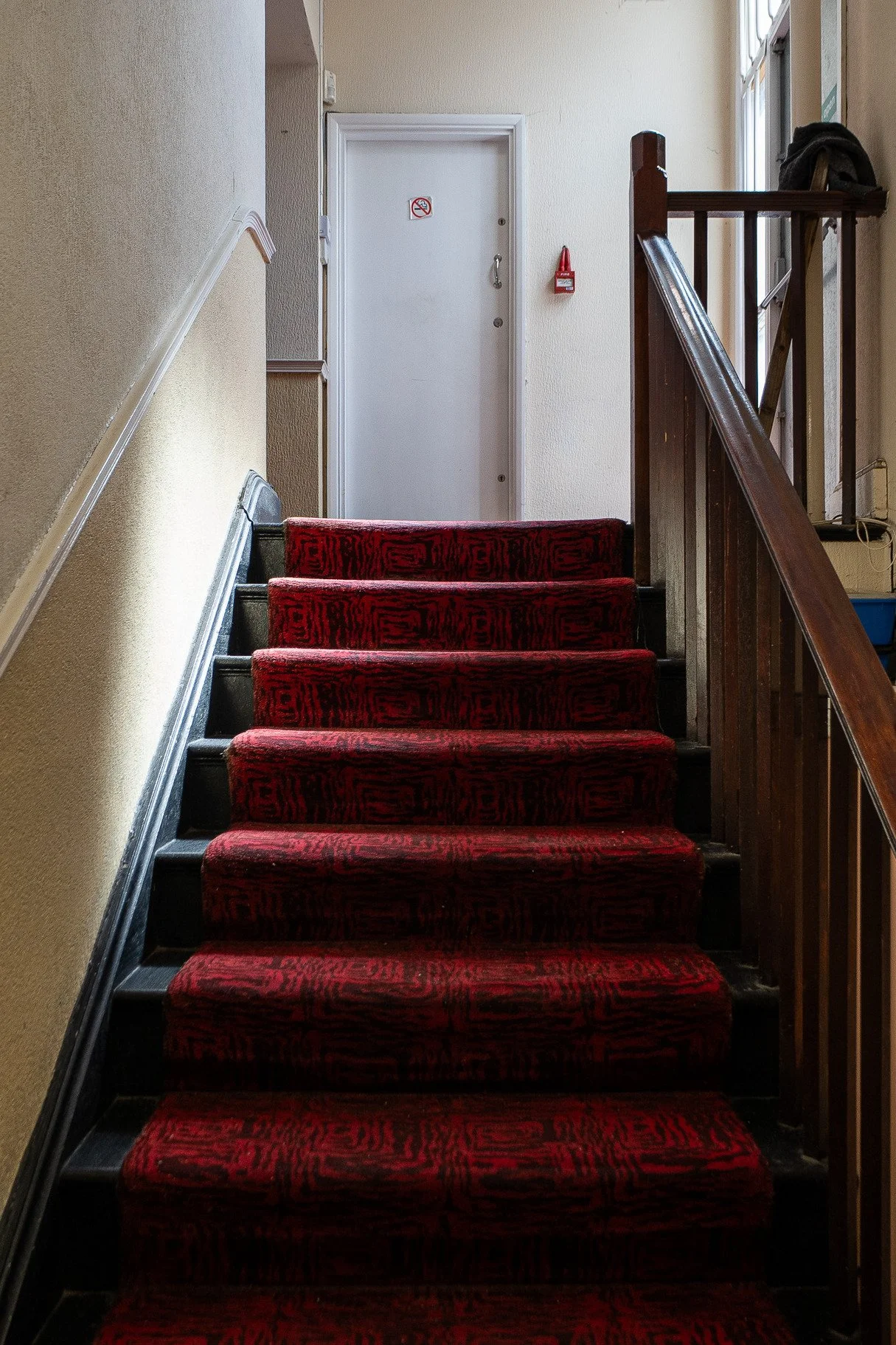 hire-a-london-1970s-traditional-working-mens-club-film-photo-shoot-event-location-stairway-carpet.jpg