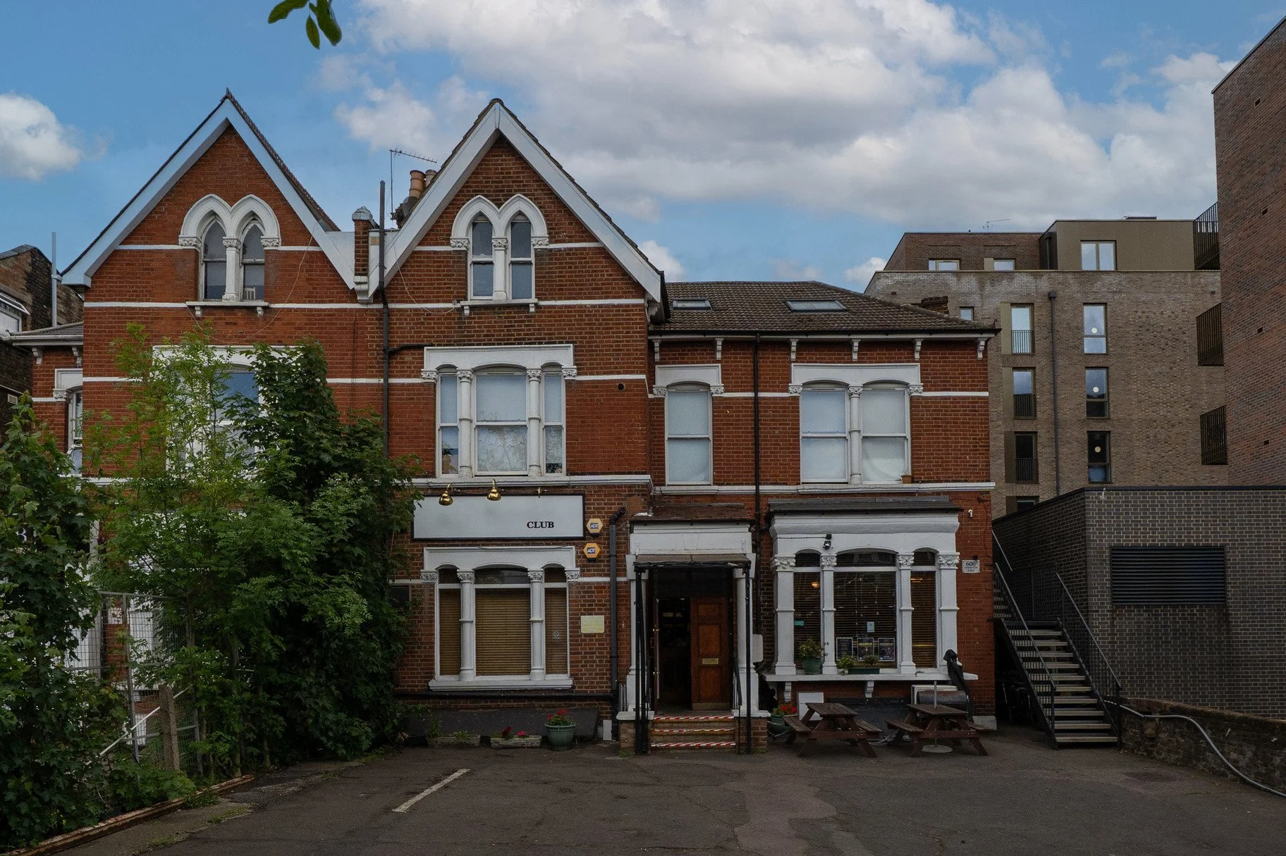 hire-a-london-1970s-traditional-working-mens-club-film-photo-shoot-event-location-front-door.jpg