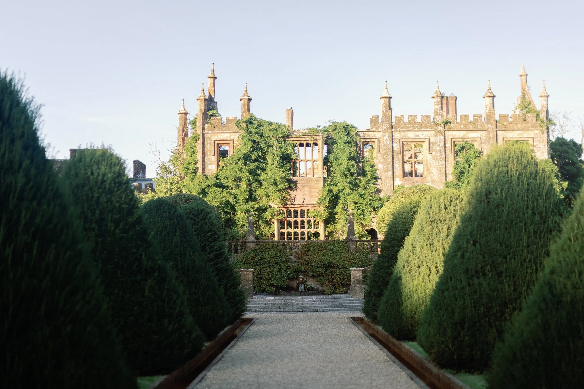 dorset-historic-tudor-regency-gothic-romance-estate-parkland-facade-yew-trees.jpg