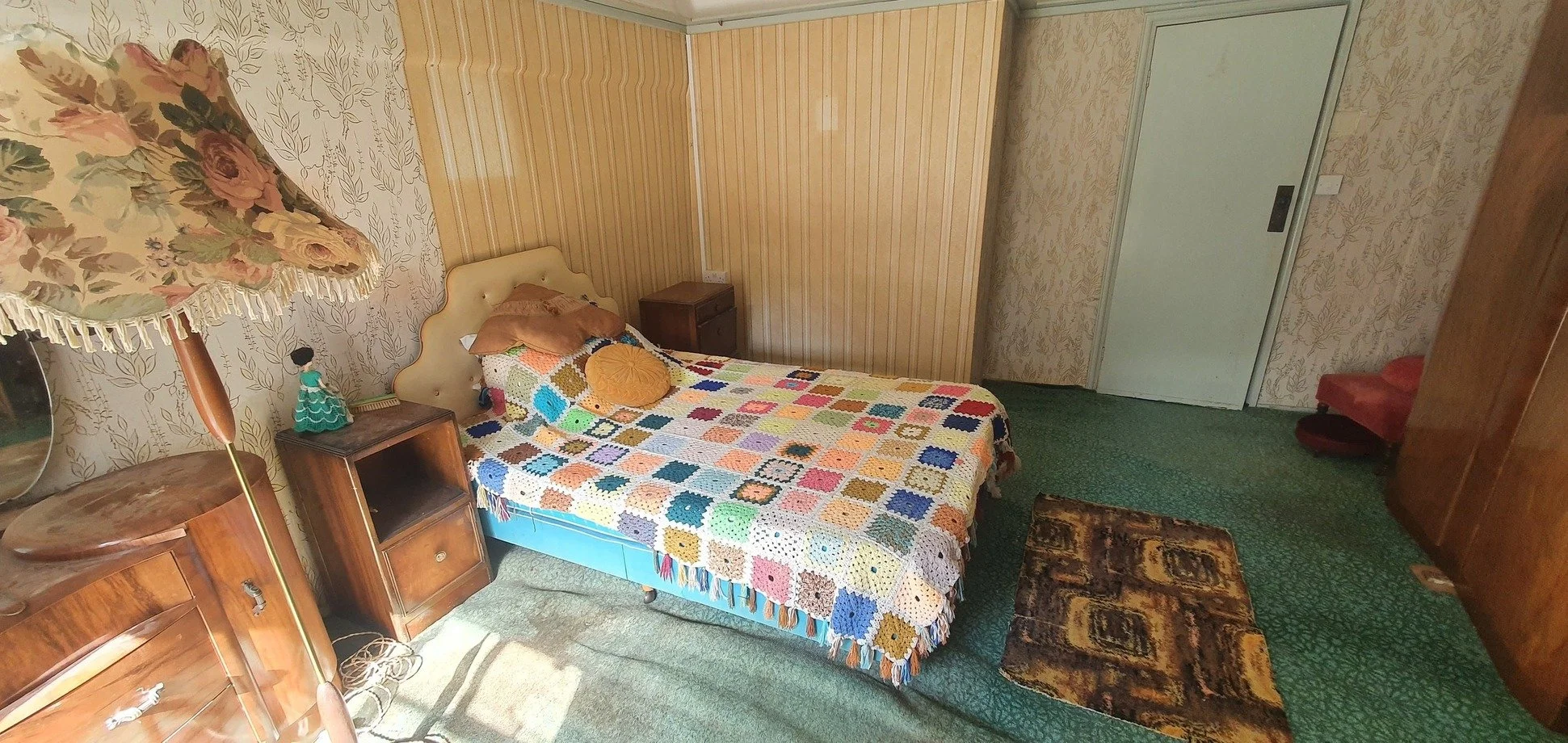 kent-16th-century-farmhouse-1960s-1970s-interior-decor-filming-photoshoots-bedroom-patchwork-quilt.jpg