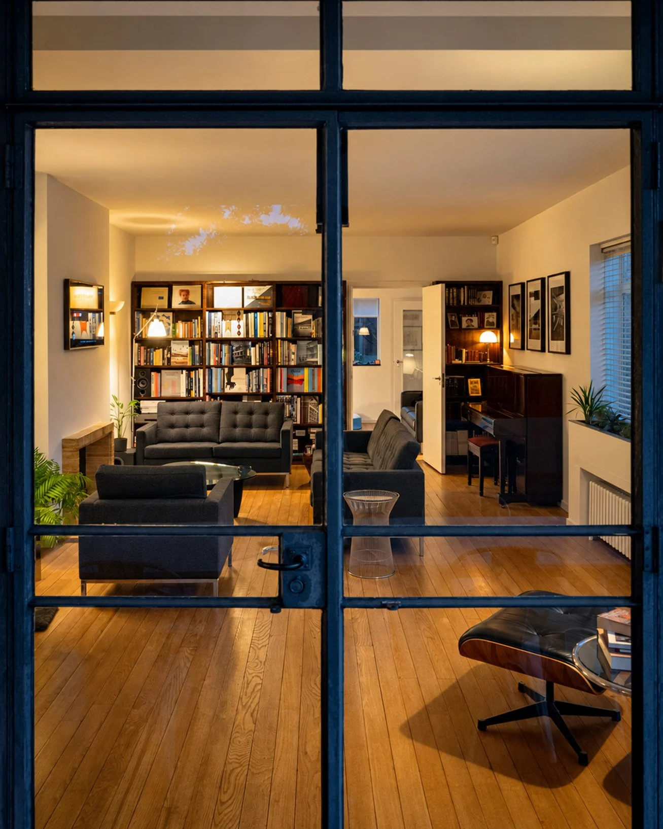 north-london-1930s-grade-ii-listed-modernist-house-filming-photoshoots-book-shelves.jpg