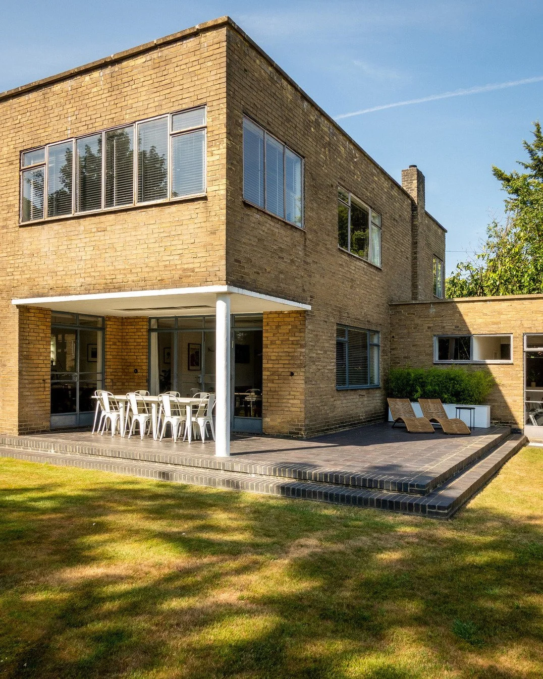 north-london-1930s-grade-ii-listed-modernist-house-filming-photoshoots-white-patio-furniture.jpg