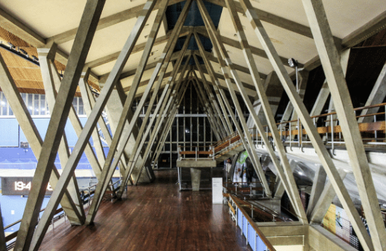 Steel roof struts in sports centre corridor