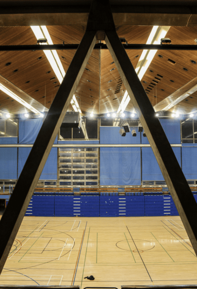 south-east-london-brutalist-sports-centre-filming-photoshoots-events-ceiling-strip-lights.png