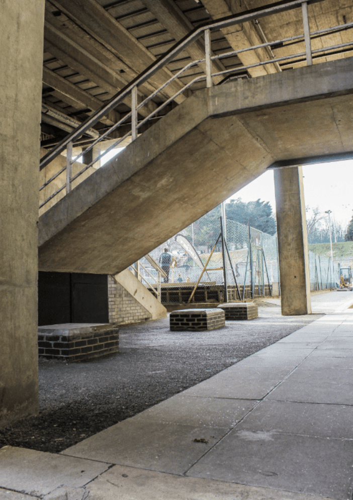 south-east-london-brutalist-sports-centre-filming-photoshoots-events-concrete-stairs-rails.png