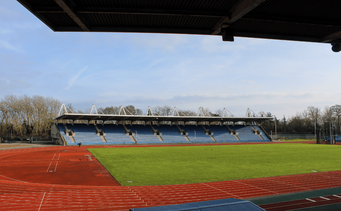 south-east-london-brutalist-sports-centre-filming-photoshoots-events-grass-pitch.png
