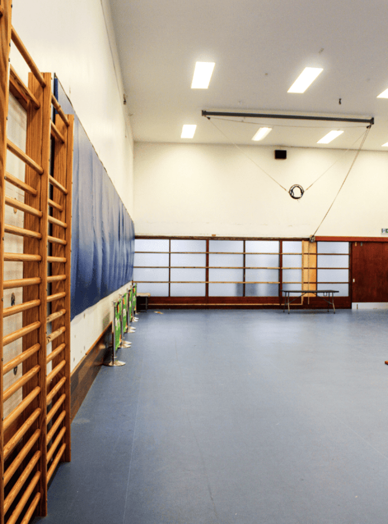 south-east-london-brutalist-sports-centre-filming-photoshoots-events-wooden-wall-gym-equipment.png