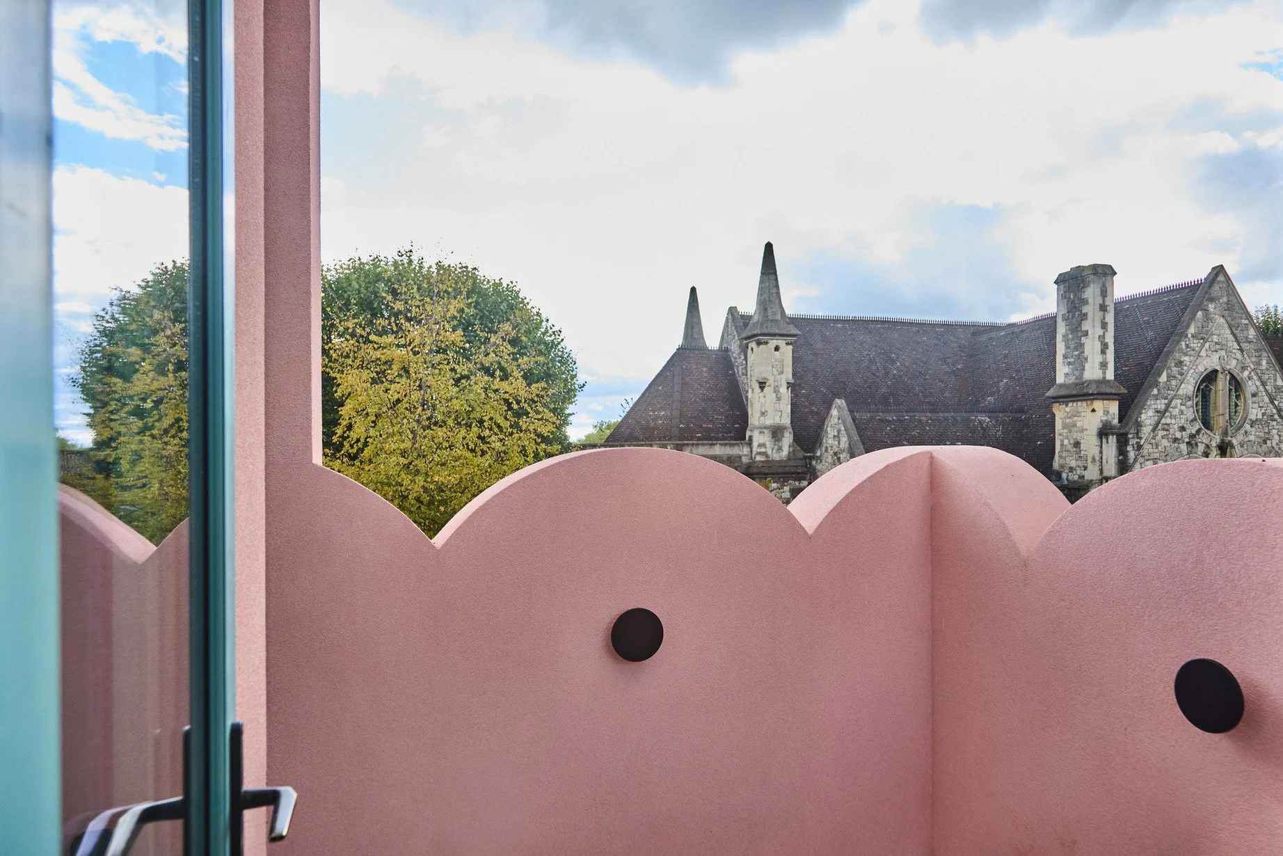 london-pink-wes-anderson-style-colourful-house-roof-terrace-filming-photoshoots-balcony-view.jpg