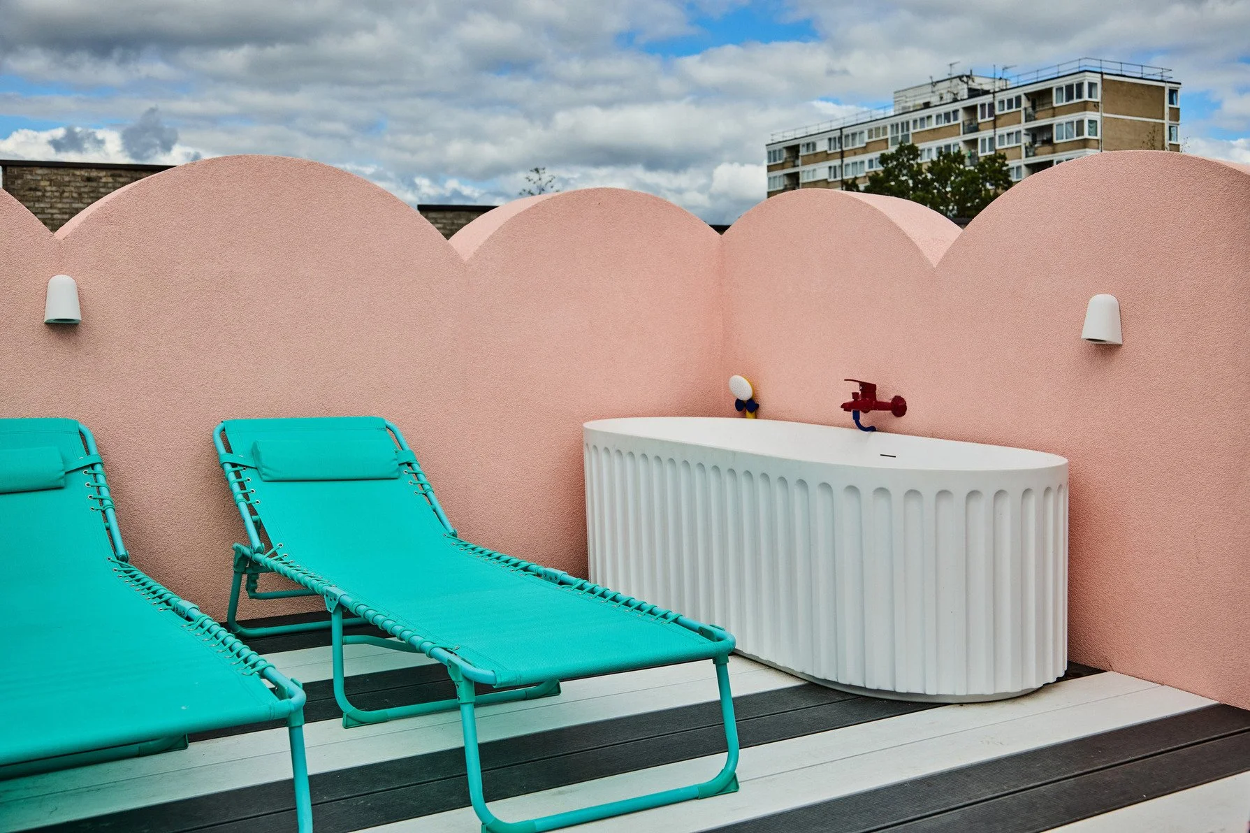london-pink-wes-anderson-style-colourful-house-roof-terrace-filming-photoshoots-bath-tub.jpg