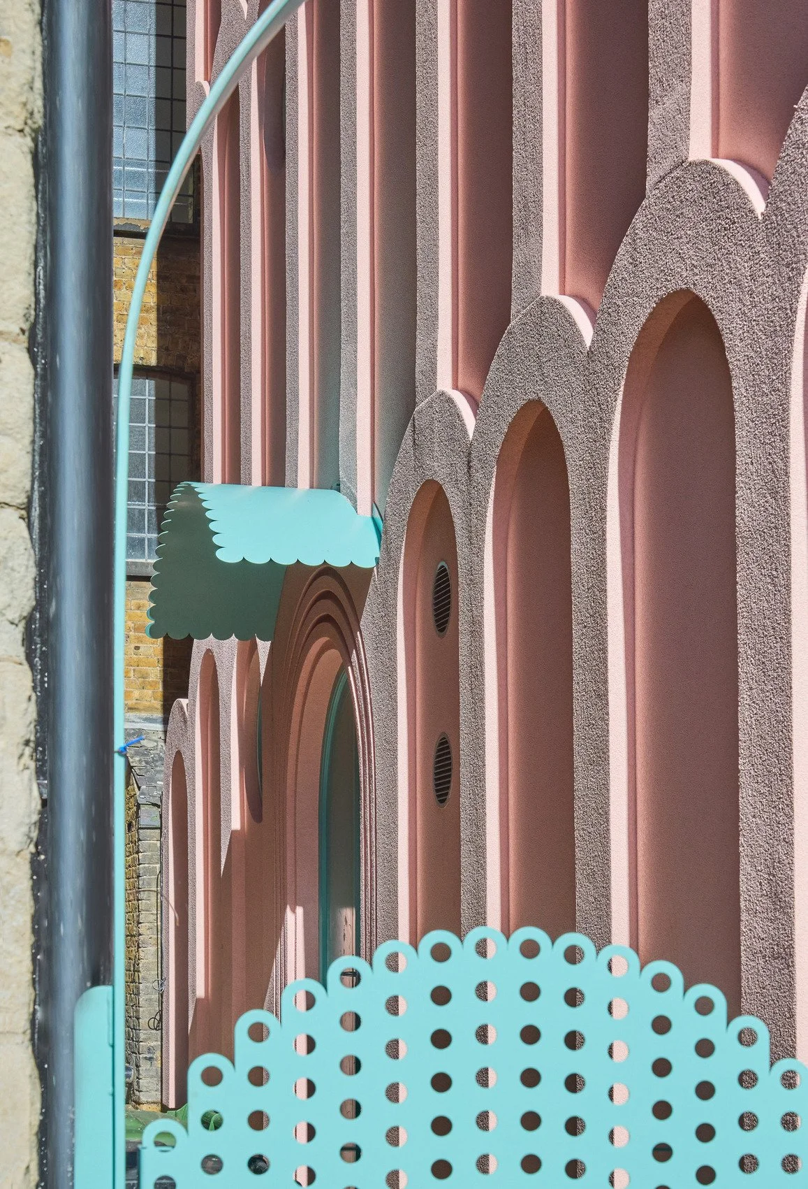 london-pink-wes-anderson-style-colourful-house-roof-terrace-filming-photoshoots-entrance.jpg