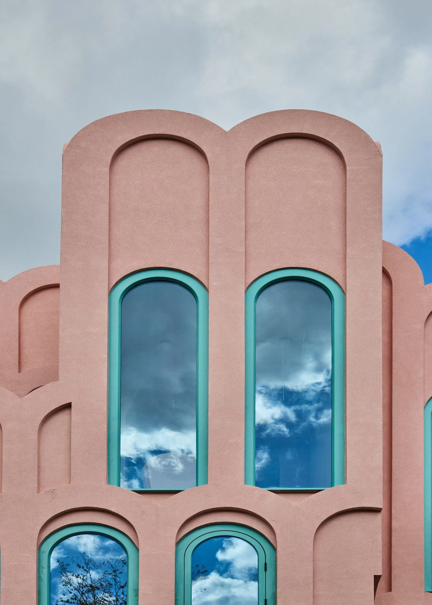 london-pink-wes-anderson-style-colourful-house-roof-terrace-filming-photoshoots-features-archways.jpg