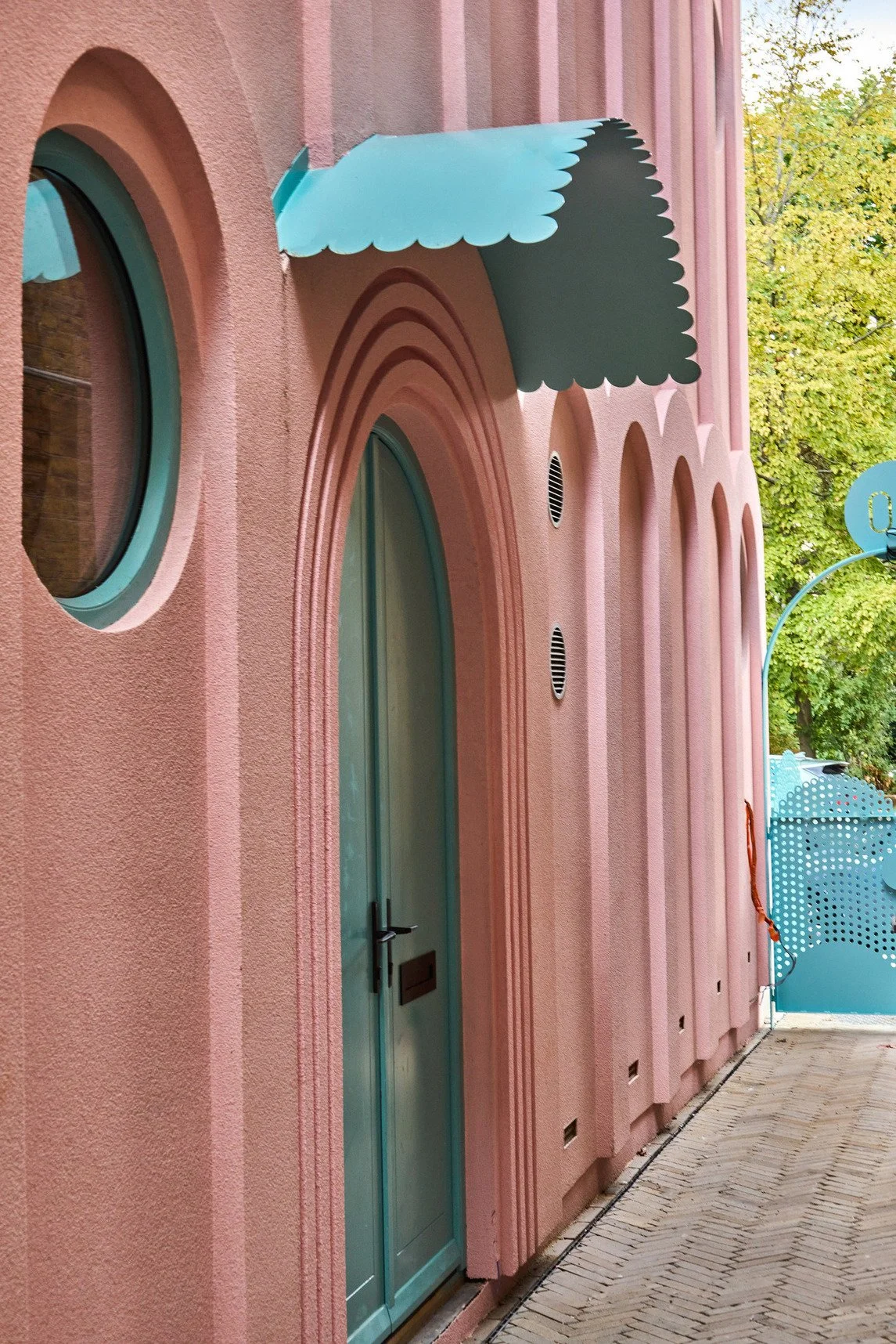 london-pink-wes-anderson-style-colourful-house-roof-terrace-filming-photoshoots-front-door.jpg