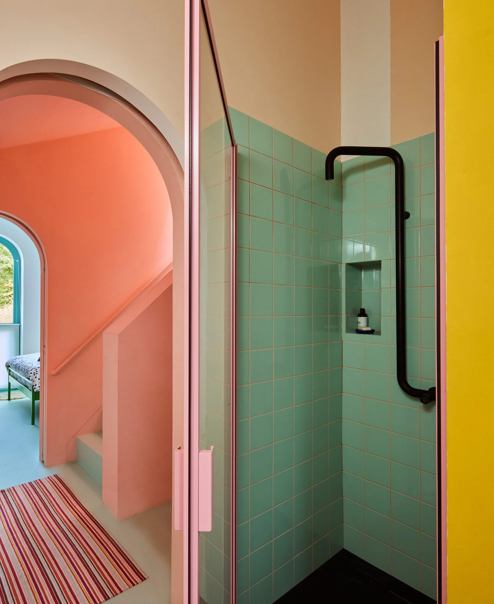 london-pink-wes-anderson-style-colourful-house-roof-terrace-filming-photoshoots-green-tiled-shower.jpg