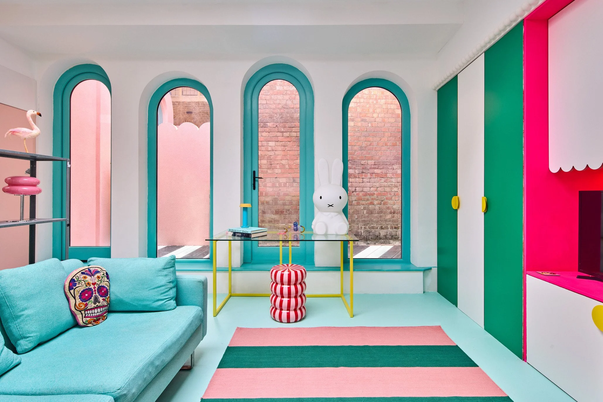 london-pink-wes-anderson-style-colourful-house-roof-terrace-filming-photoshoots-living-room.jpg