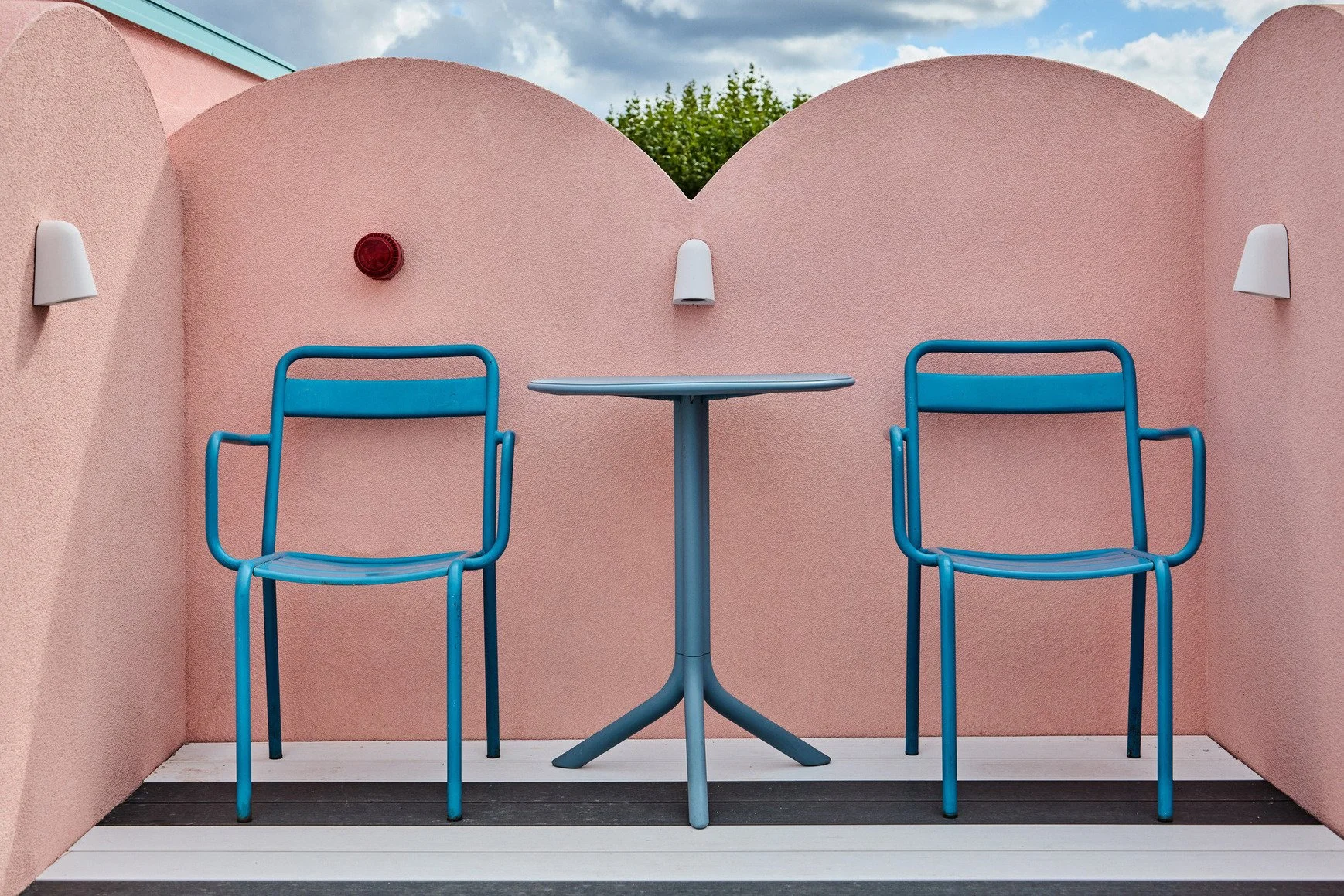 london-pink-wes-anderson-style-colourful-house-roof-terrace-filming-photoshoots-patio-chairs.jpg