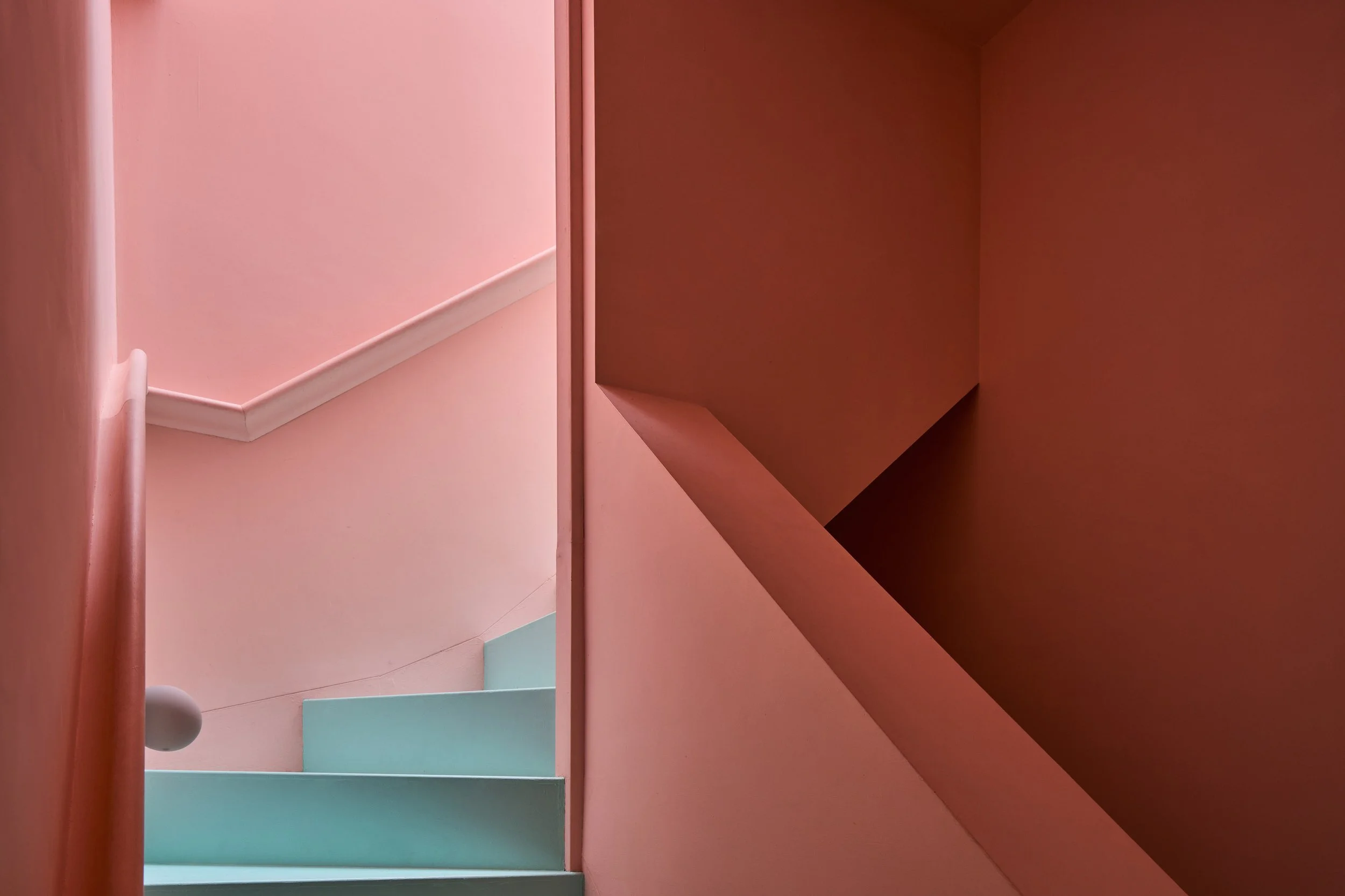 london-pink-wes-anderson-style-colourful-house-roof-terrace-filming-photoshoots-staircase.jpg