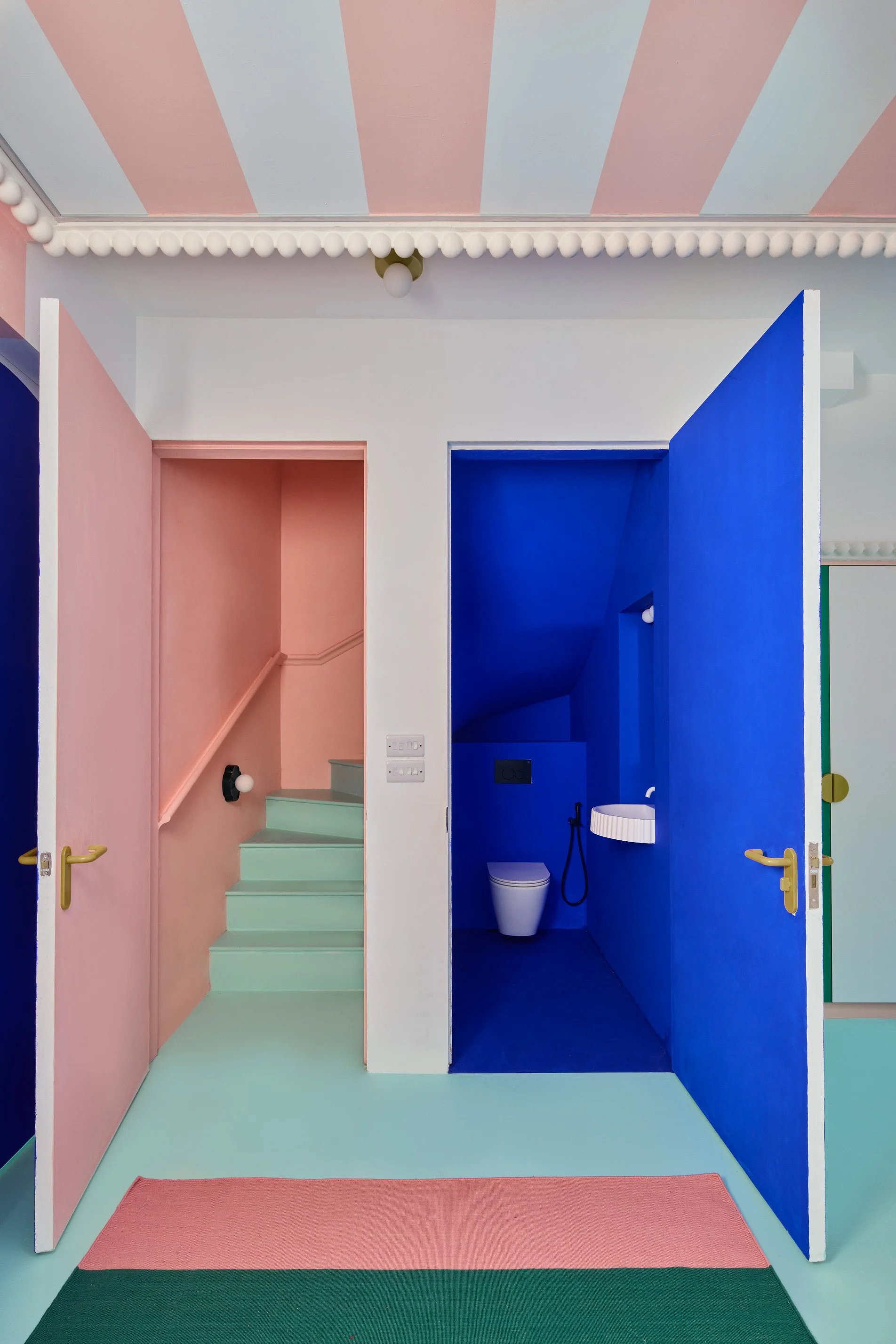 london-pink-wes-anderson-style-colourful-house-roof-terrace-filming-photoshoots-striped-ceiling.jpg