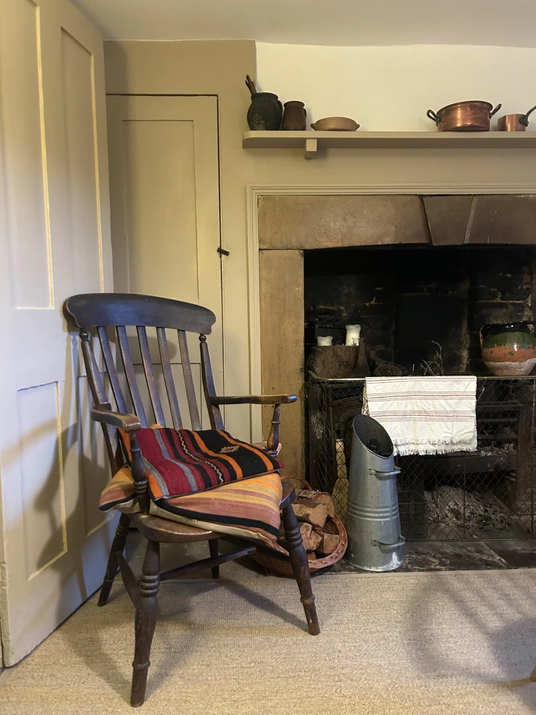 london-grade-ii-listed-georgian-townhouse-historic-period-interiors-filming-photoshoots-fireplace-rocking-chair.jpg