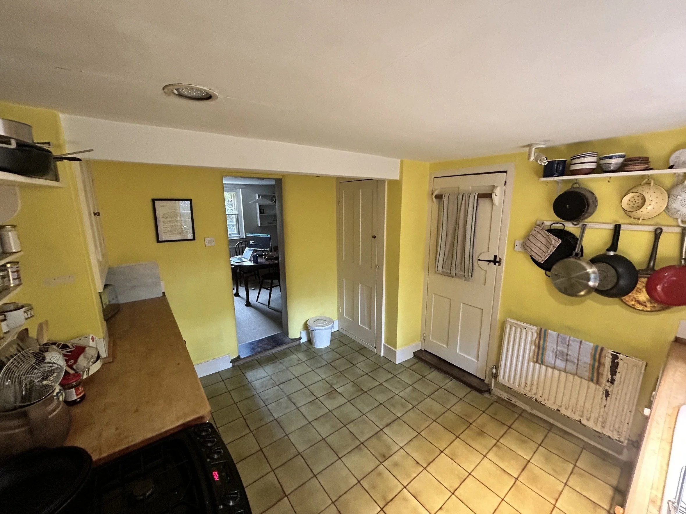 london-grade-ii-listed-georgian-townhouse-historic-period-interiors-filming-photoshoots-kitchen-pan-rack.jpg