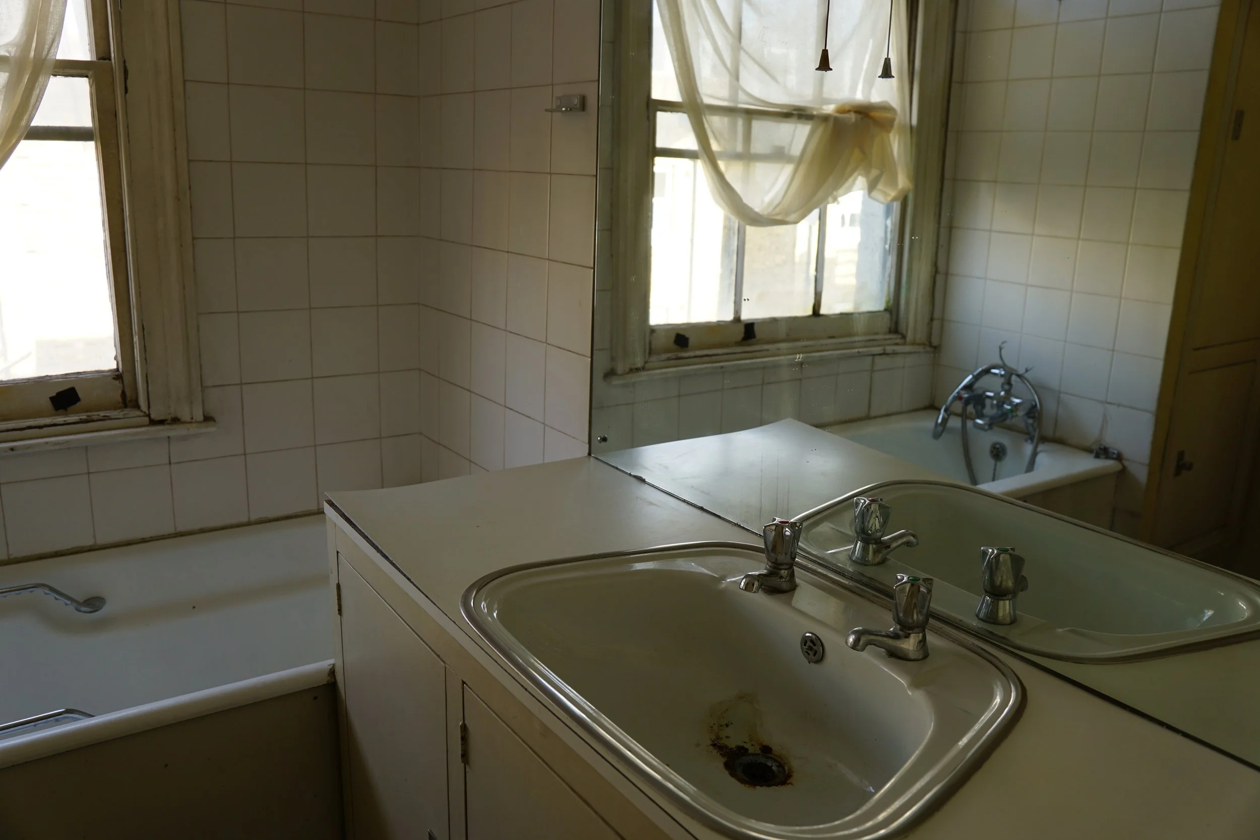 london-retro-distressed-white-stucco-terraced-house-unmodernised-filming-photoshoots-events-bathroom-sink.jpg