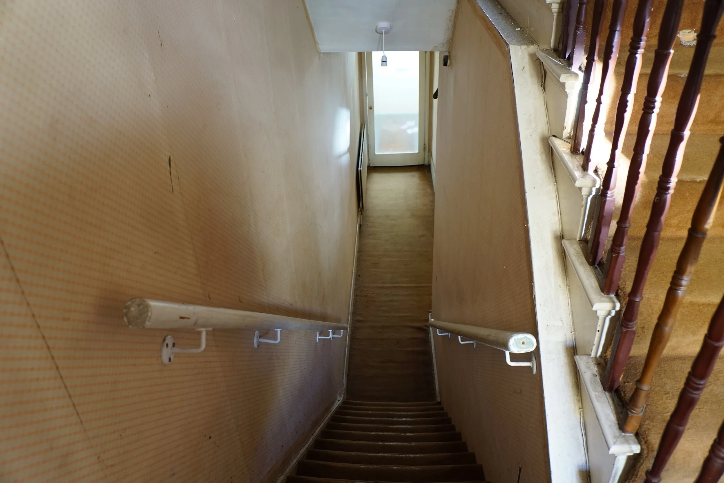 london-retro-distressed-white-stucco-terraced-house-unmodernised-filming-photoshoots-events-hallway.jpg