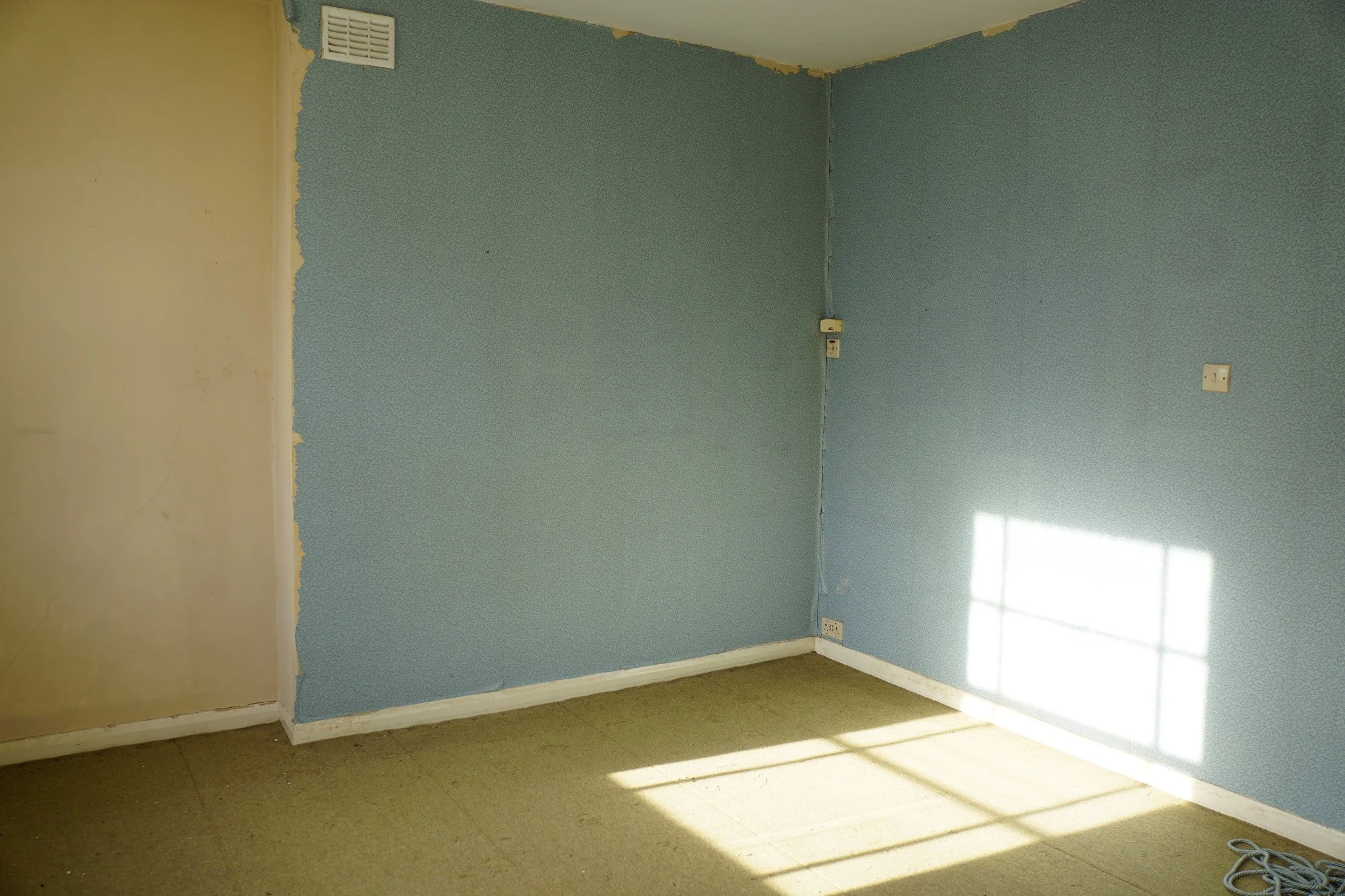 london-retro-distressed-white-stucco-terraced-house-unmodernised-filming-photoshoots-events-pale-blue-walls.jpg