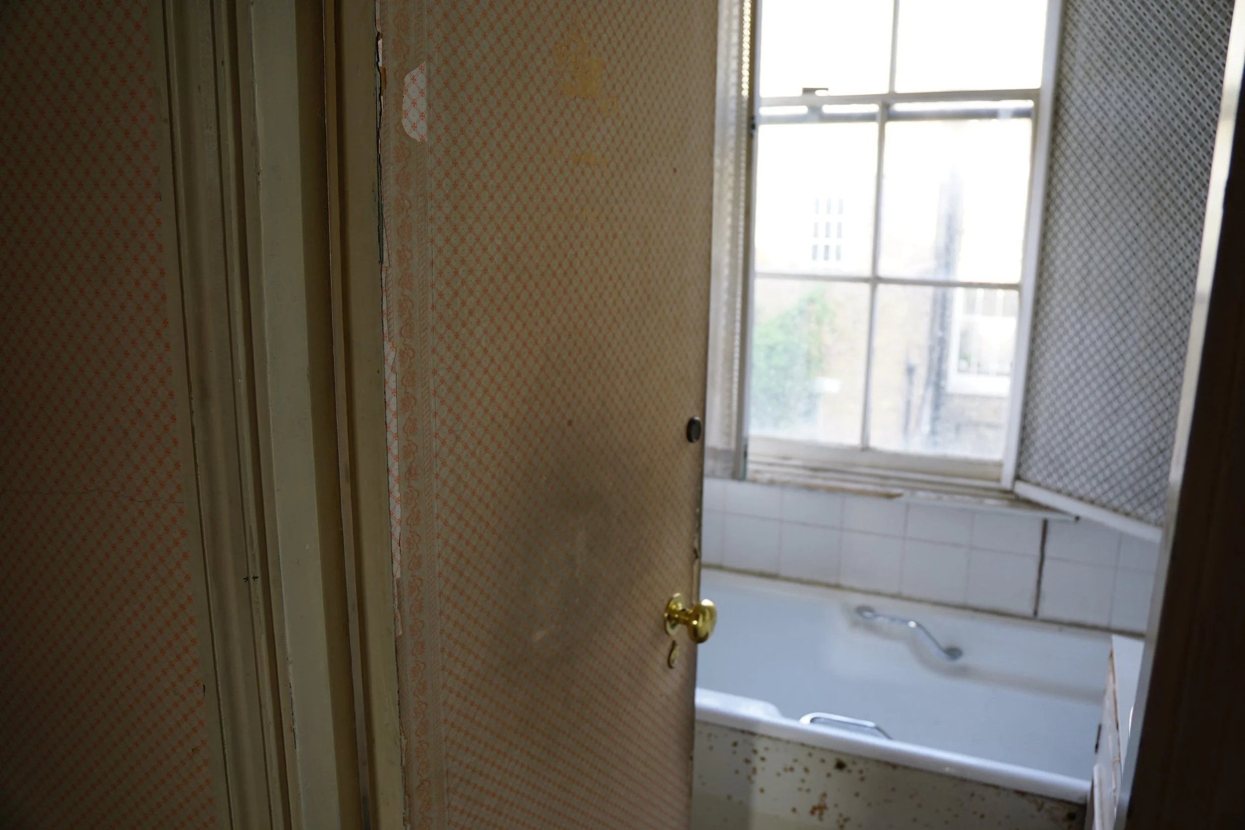 london-retro-distressed-white-stucco-terraced-house-unmodernised-filming-photoshoots-events-sash-windows.jpg