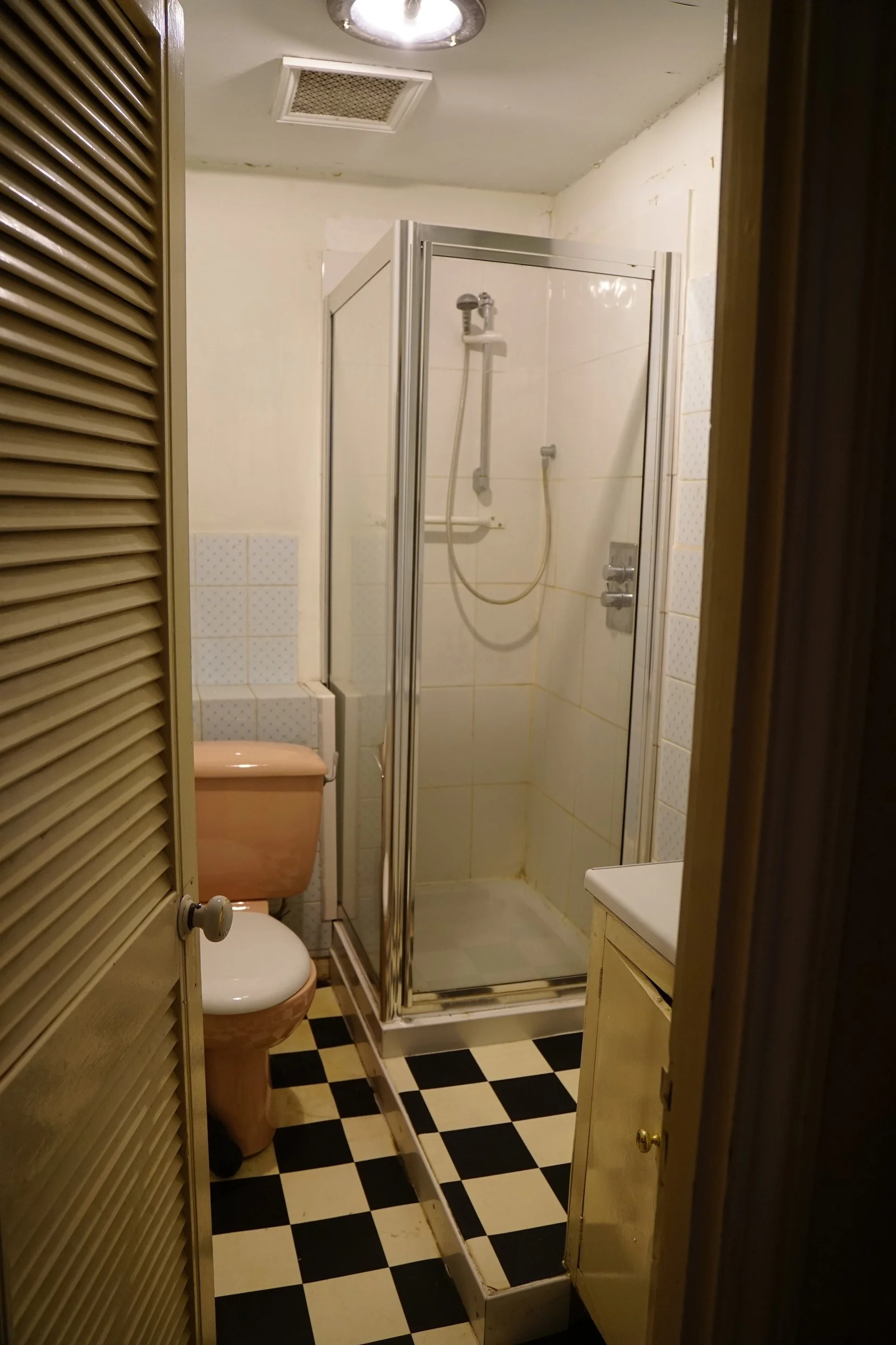 london-retro-distressed-white-stucco-terraced-house-unmodernised-filming-photoshoots-events-shower.jpg