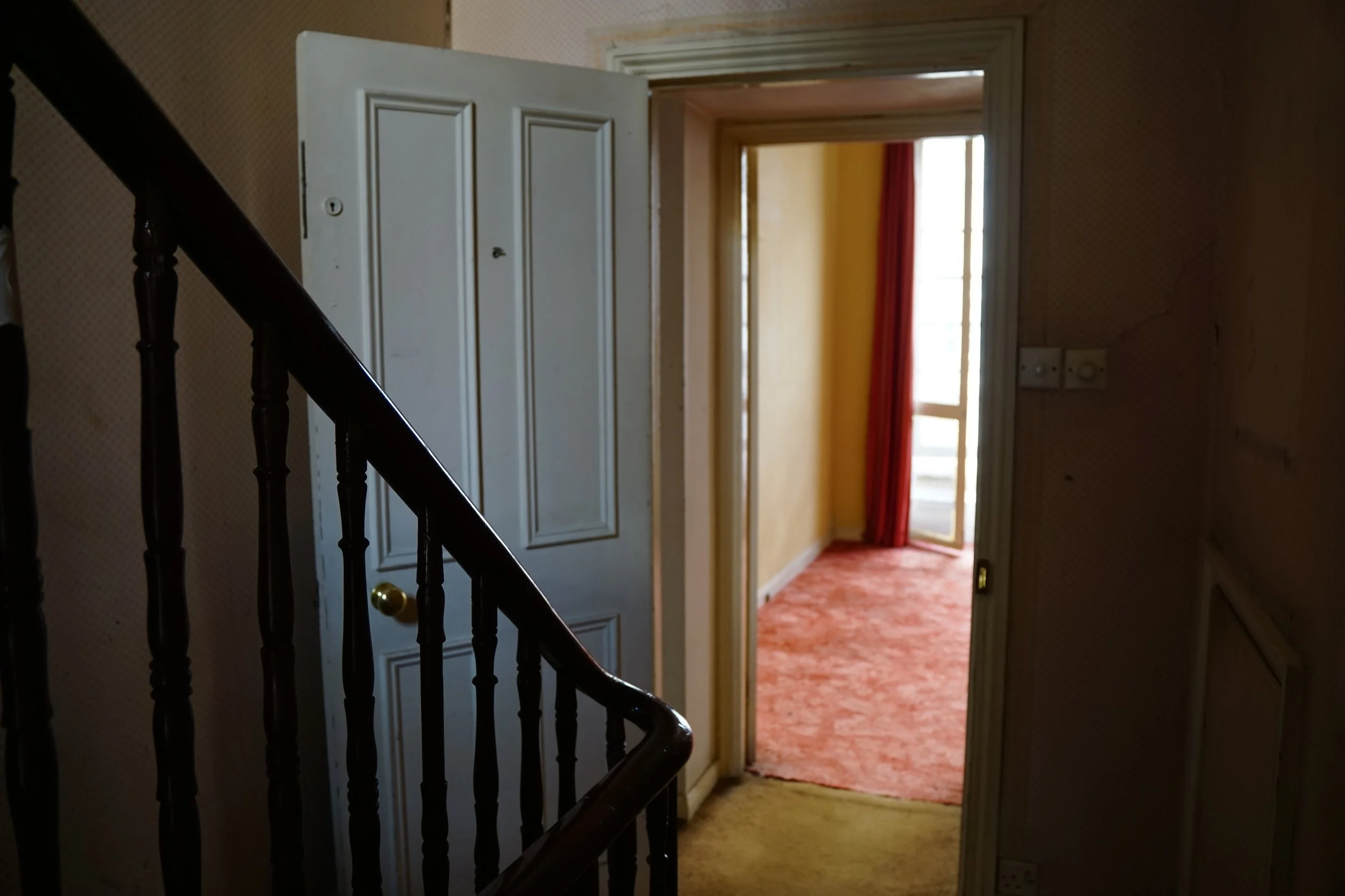 london-retro-distressed-white-stucco-terraced-house-unmodernised-filming-photoshoots-events-white-door.jpg