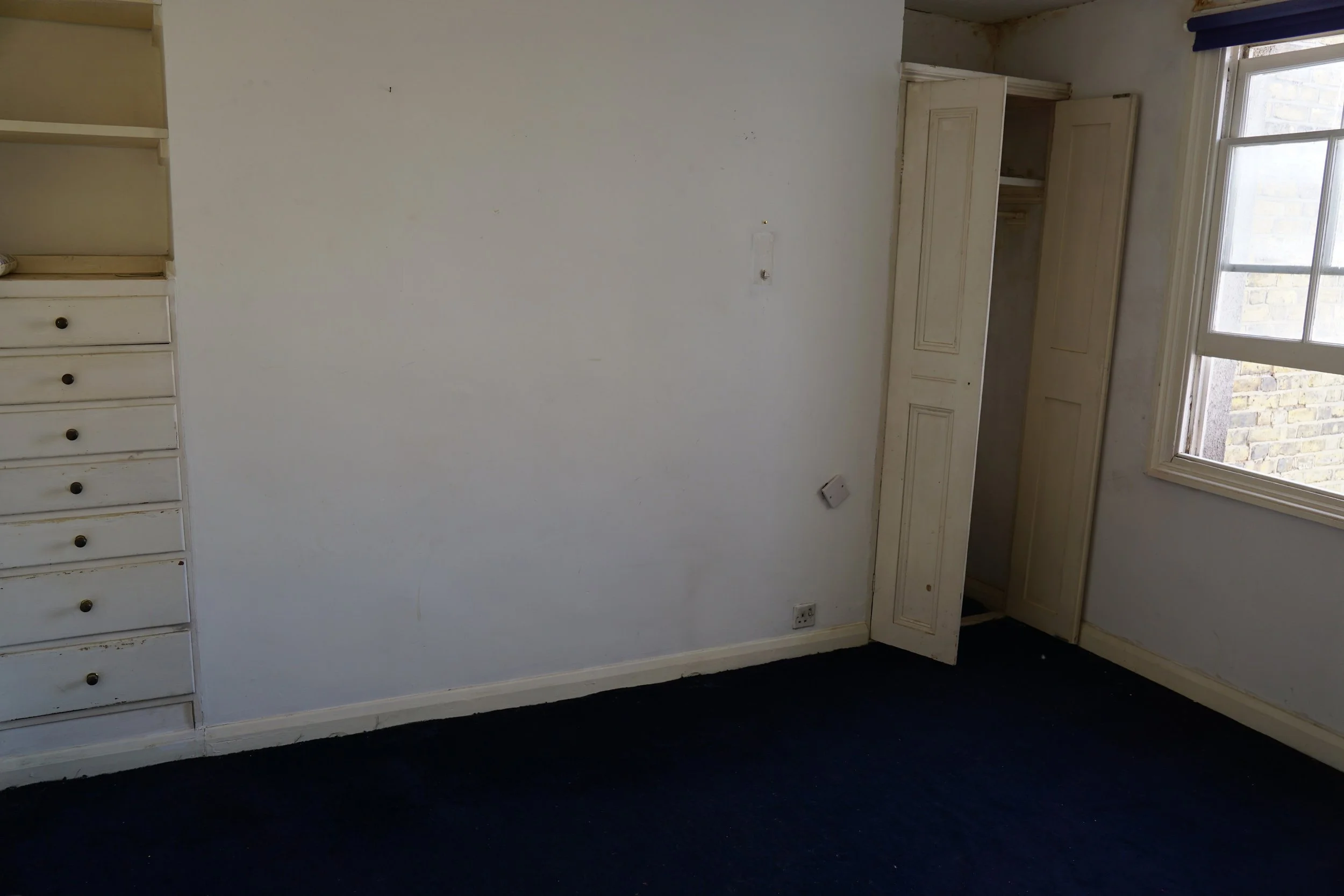 london-retro-distressed-white-stucco-terraced-house-unmodernised-filming-photoshoots-events-white-walls.jpg