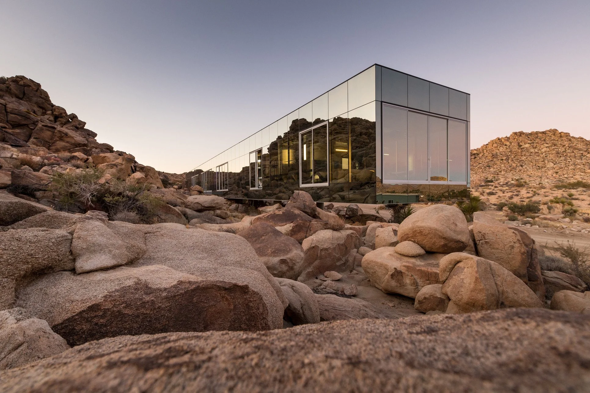 unique-joshua-tree-california-invisible-house-mirrored-horizontal-skyscraper-desert-architecture-filming-photoshoots-events-boulders-exterior.jpg