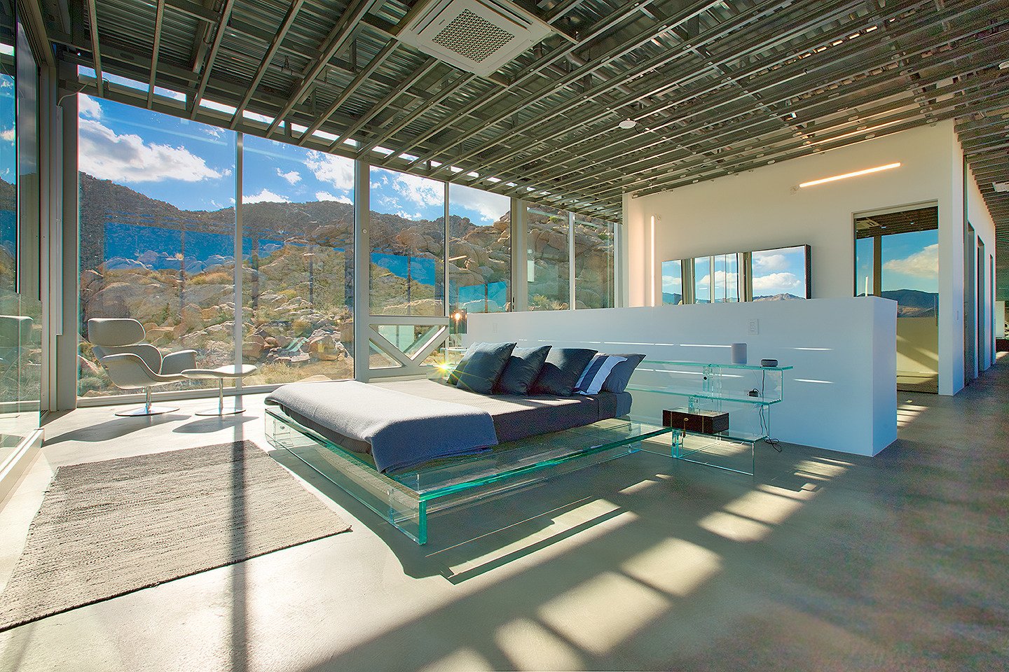 unique-joshua-tree-california-invisible-house-mirrored-horizontal-skyscraper-desert-architecture-filming-photoshoots-events-double-bed-pillows copy.jpg