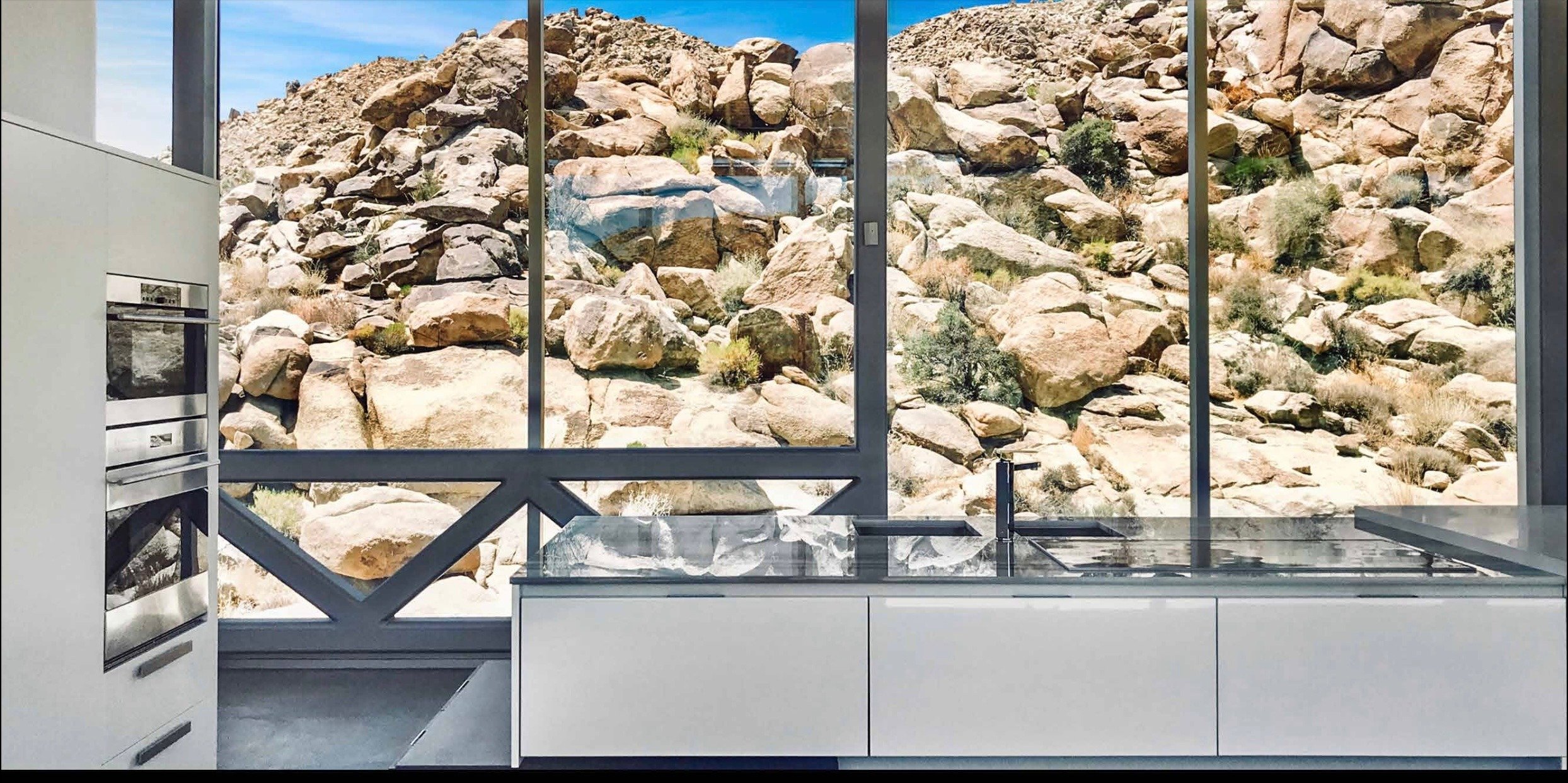 unique-joshua-tree-california-invisible-house-mirrored-horizontal-skyscraper-desert-architecture-filming-photoshoots-events-kitchen-sink copy.jpg